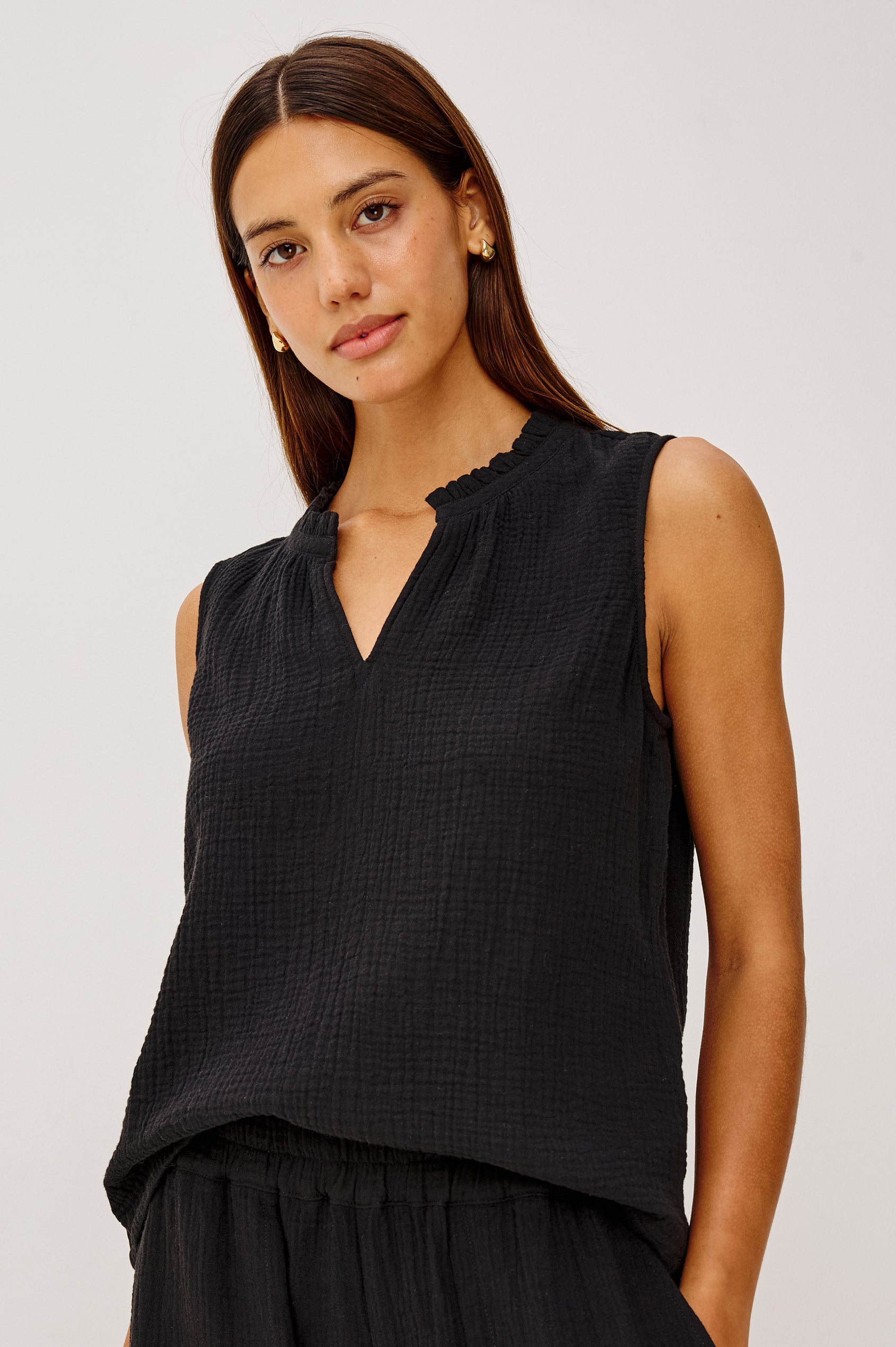 Christy Cotton Gauze Sleeveless Top with Collared V-Neck In Colorway Black - Front View Featured On Model