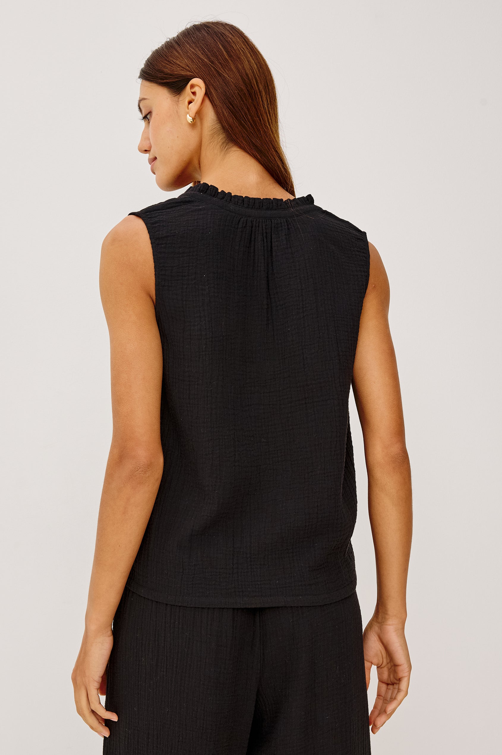 Christy Cotton Gauze Sleeveless Top with Collared V-Neck In Colorway Black - Back View Featured On Model