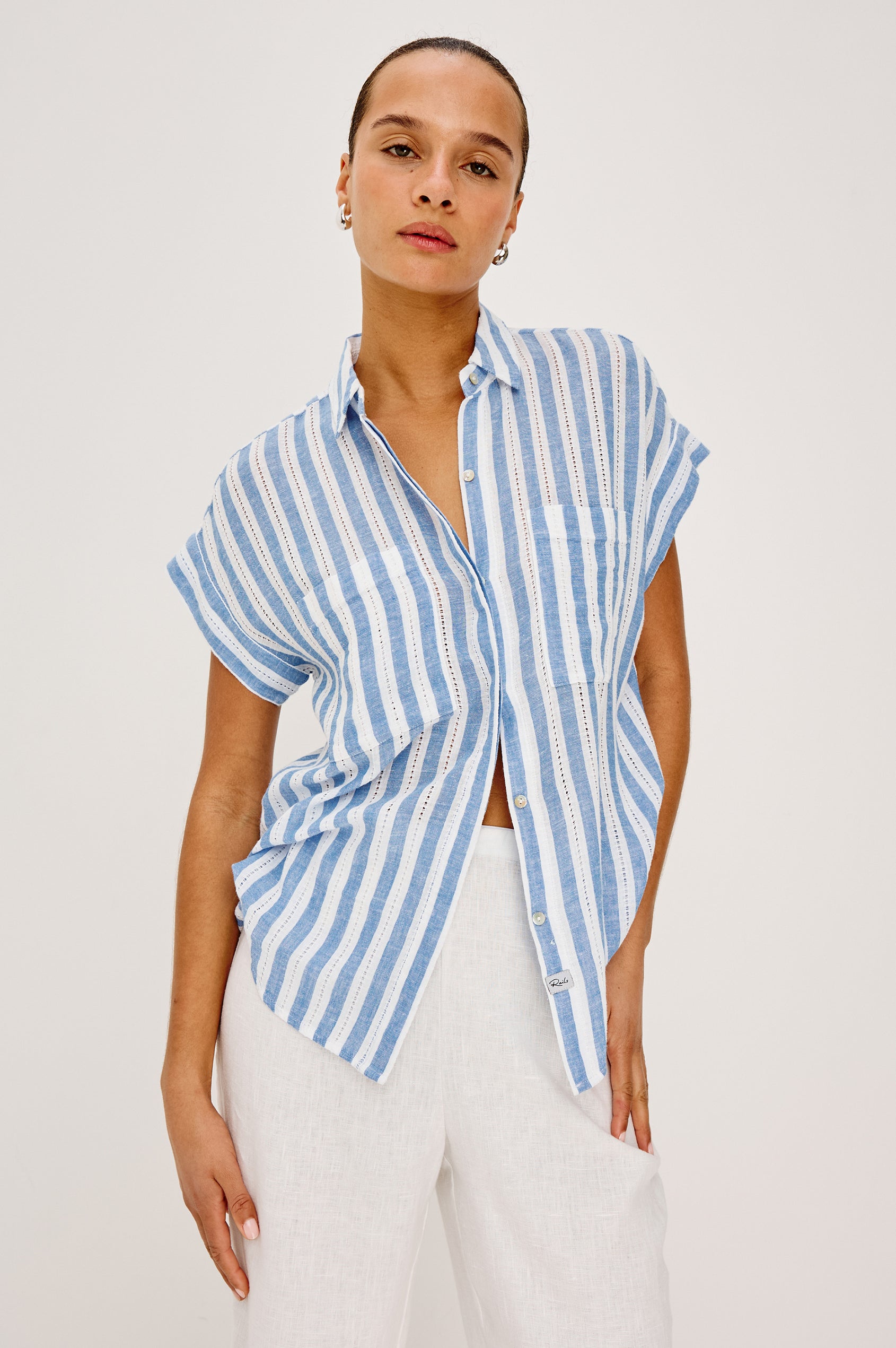 Cito Relaxed Button-Up Shirt in Luxe Linen With Collar, Chest Patch Pockets, and Cuffed Cap Sleeves in Atlantis Stripe Colorway - Upper Body Front View Featured on Model