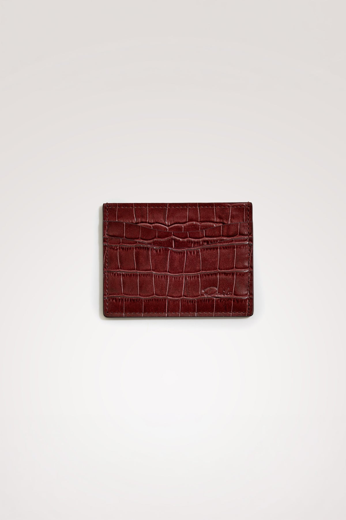 Classic Card Holder in Croc-Embossed Spanish Leather With Top Pocket, Two Front Slip Pockets, and Embossed Rails Logo in Burgundy Croc Embossed Colorway -