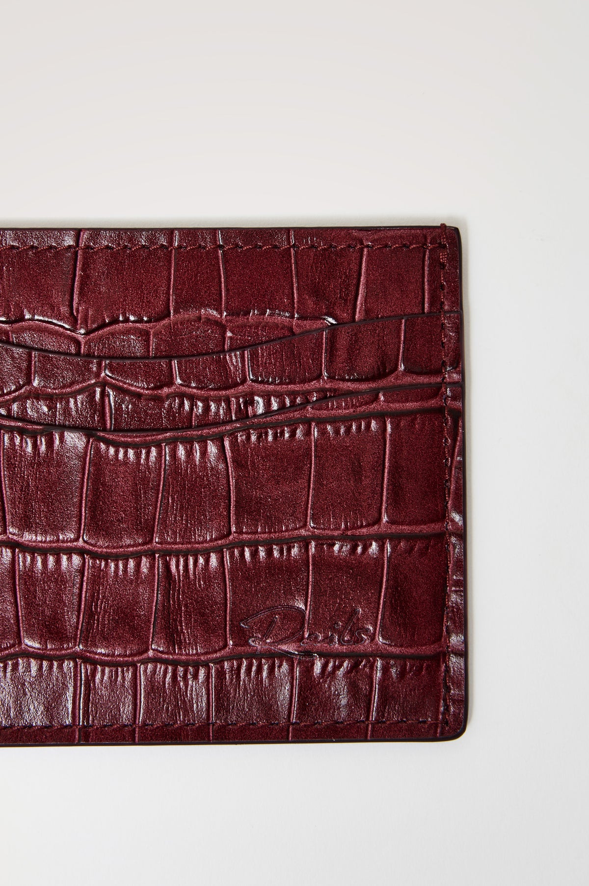 Classic Card Holder in Croc-Embossed Spanish Leather With Top Pocket, Two Front Slip Pockets, and Embossed Rails Logo in Burgundy Croc Embossed Colorway -