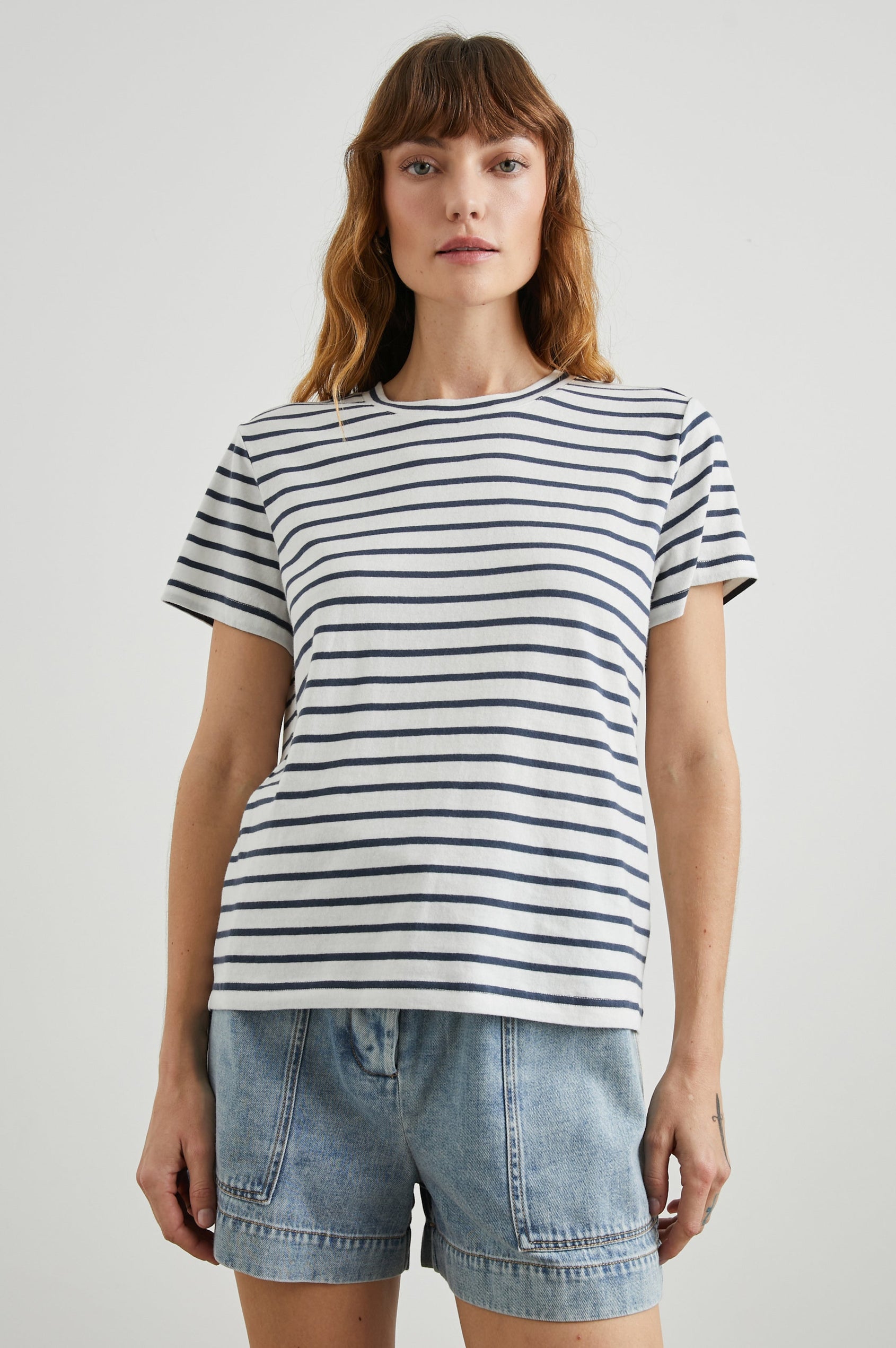 Classic Short Sleeve Crew Neck T-Shirt in Ivory Navy Stripe Colorway, Horizontal Stripes - Front View Featured on Model