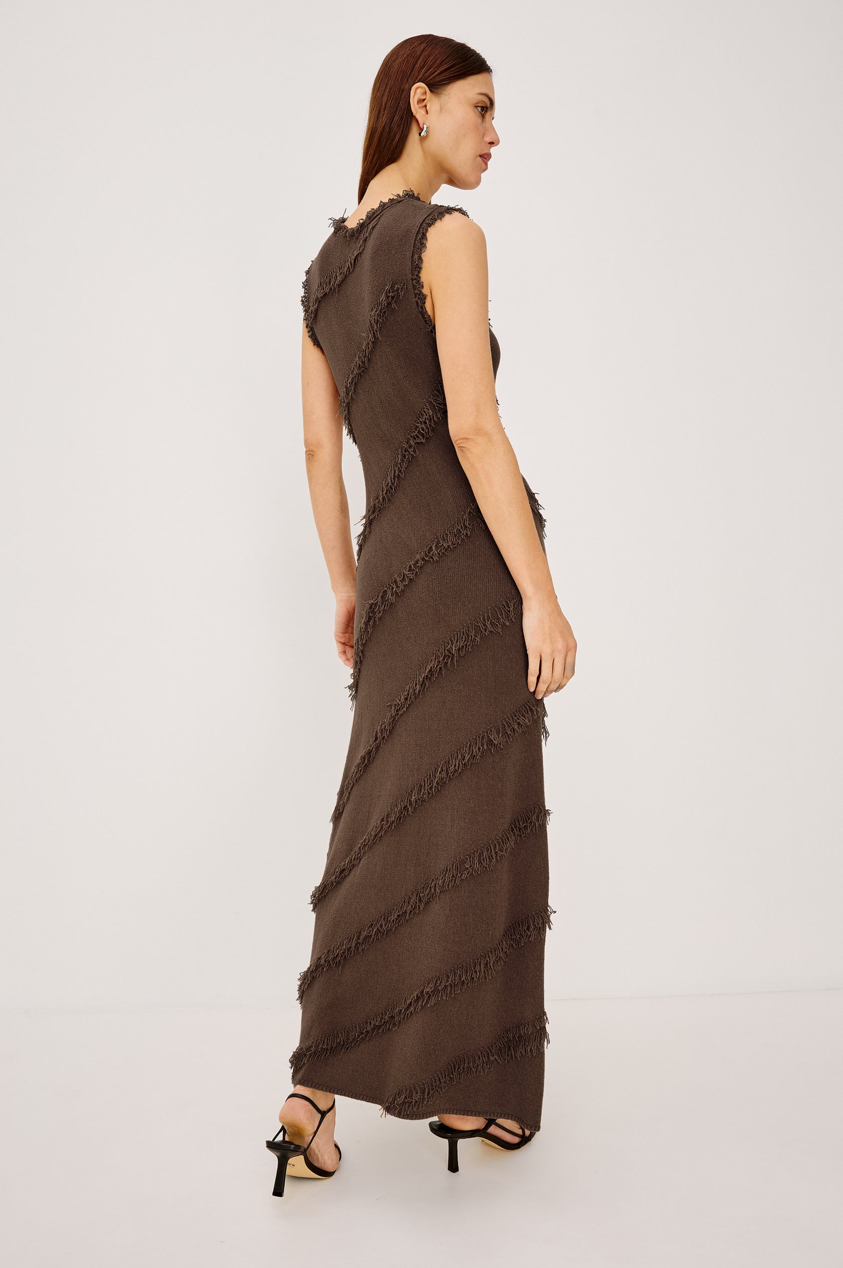 Claudia Maxi Dress in Silk Blend With Diagonal Fringe Trim, Round Neckline, and Straight Hem in Cinnamon Colorway - Full Body Back View Featured on Model