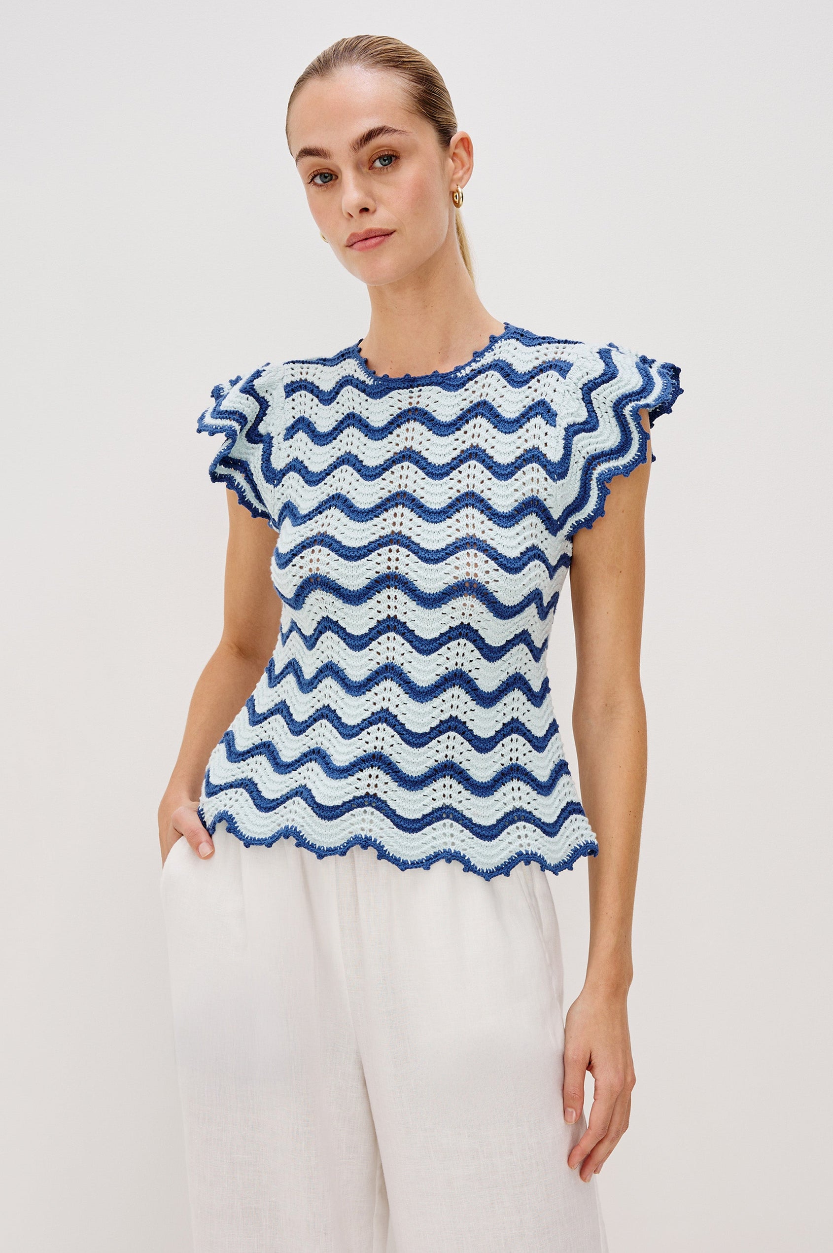 Coen Crew Neck Sweater Top with Short Flutter sleeves, Scalloped Hems in Azure Scallop Colorway. Front View Shown on Model.