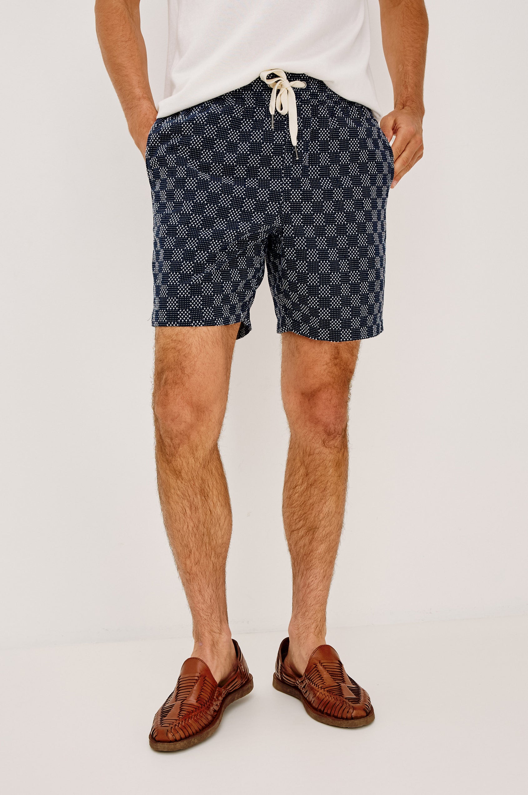 Cruz Short in Stretch Cotton With Drawstring Waist Ties, Relaxed Fit, and Side Pockets in Washed Black Colorway - Lower Body Front View Featured on Model