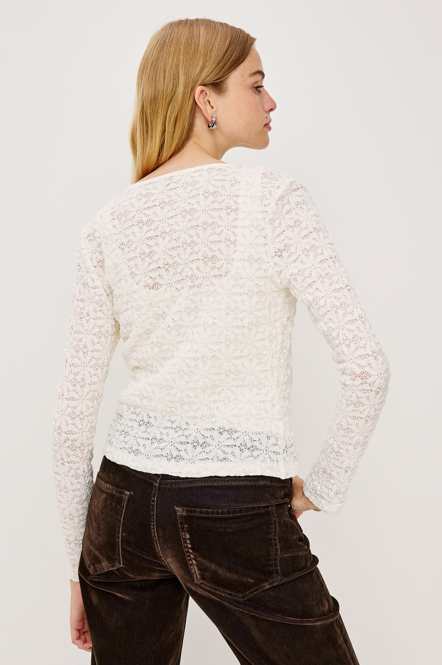 Cyrah Cardigan in Sheer Stretch Lace With Fitted Long Sleeves, and Front Button-and-Loop Closures in Ivory Colorway - Upper Body Back View Featured on Model
