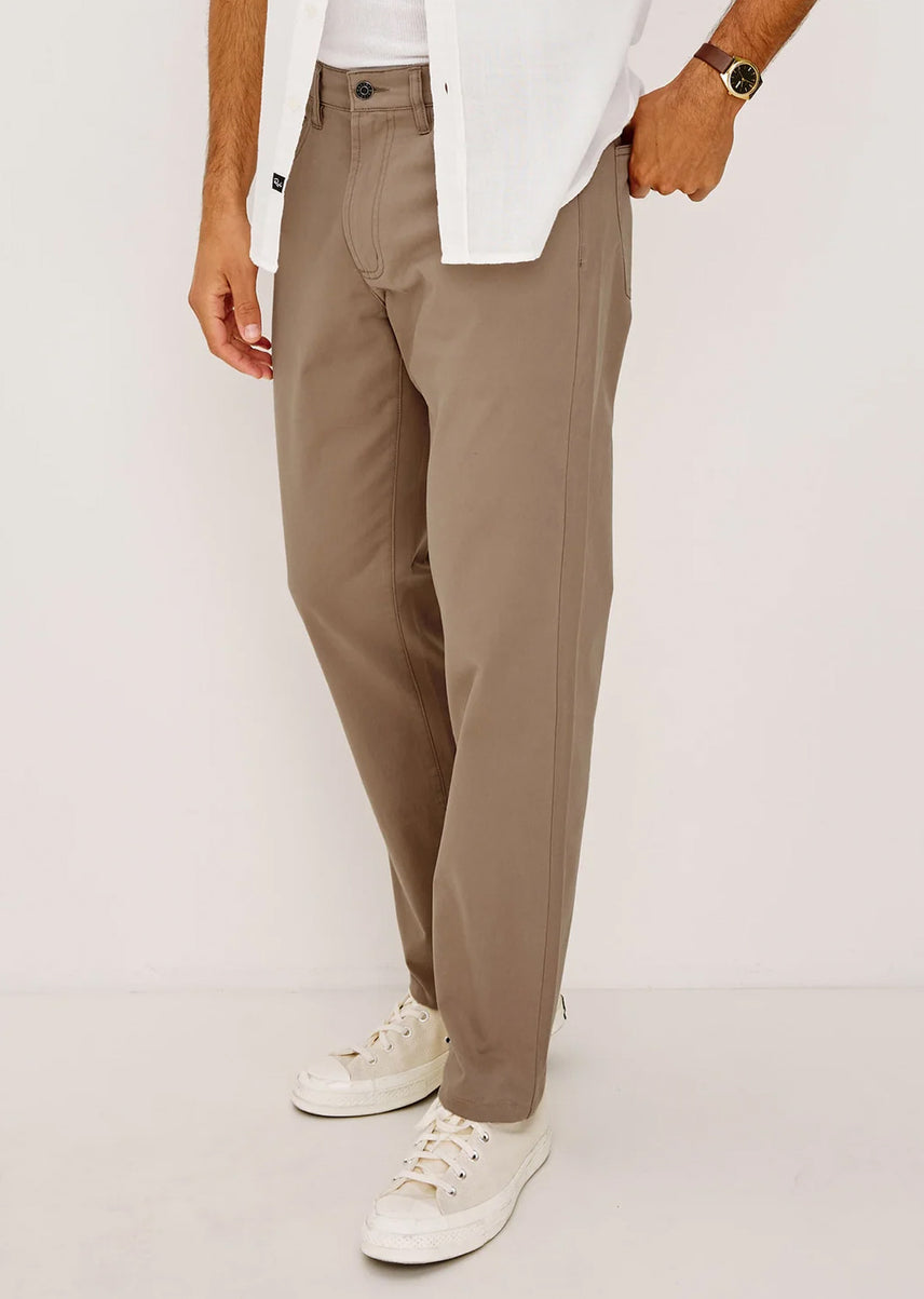 Man wearing brown neutral pants 