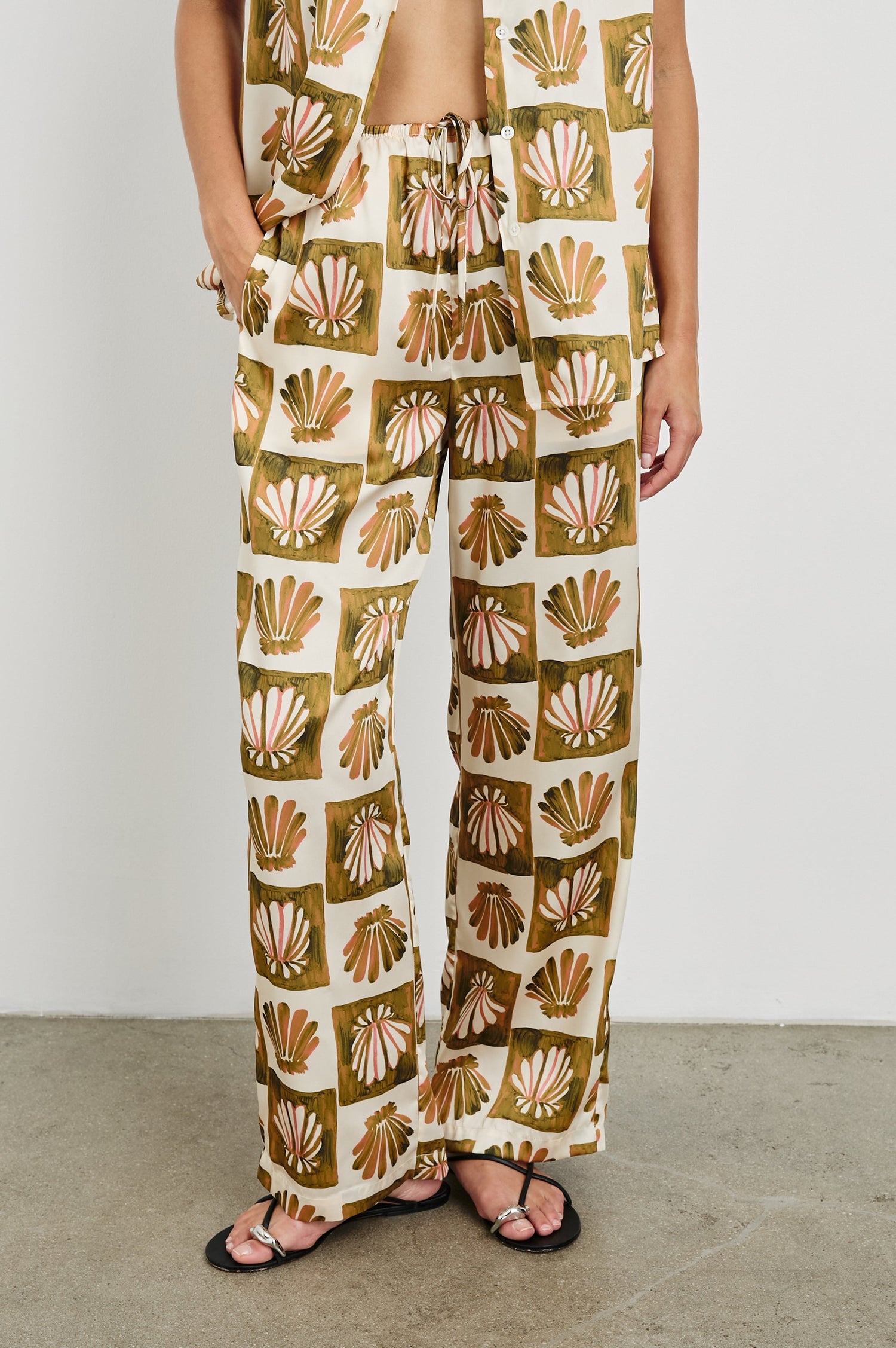 Damani Wide Leg Drawstring Pant with Side Pockets in Checkered Shells Colorway. Front View Shown on Model.