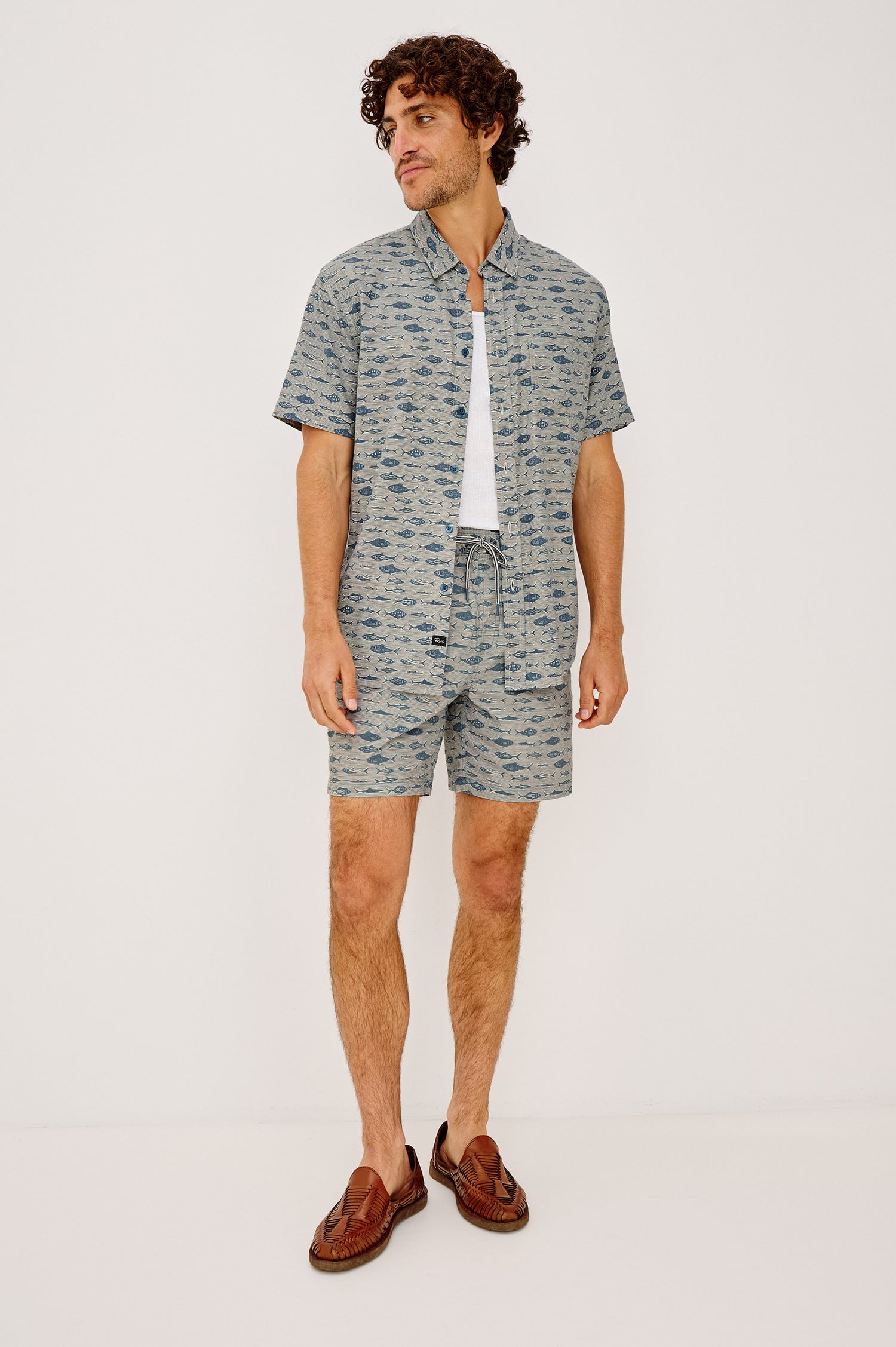 Dane Swim Short in Stretch Cotton Poly Blend With Drawstring Waist Ties, Relaxed Fit, Side Pockets, and Back Zip Welt Pocket in Vintage Aquarium Etch Colorway - Full Body Front View Featured on Model