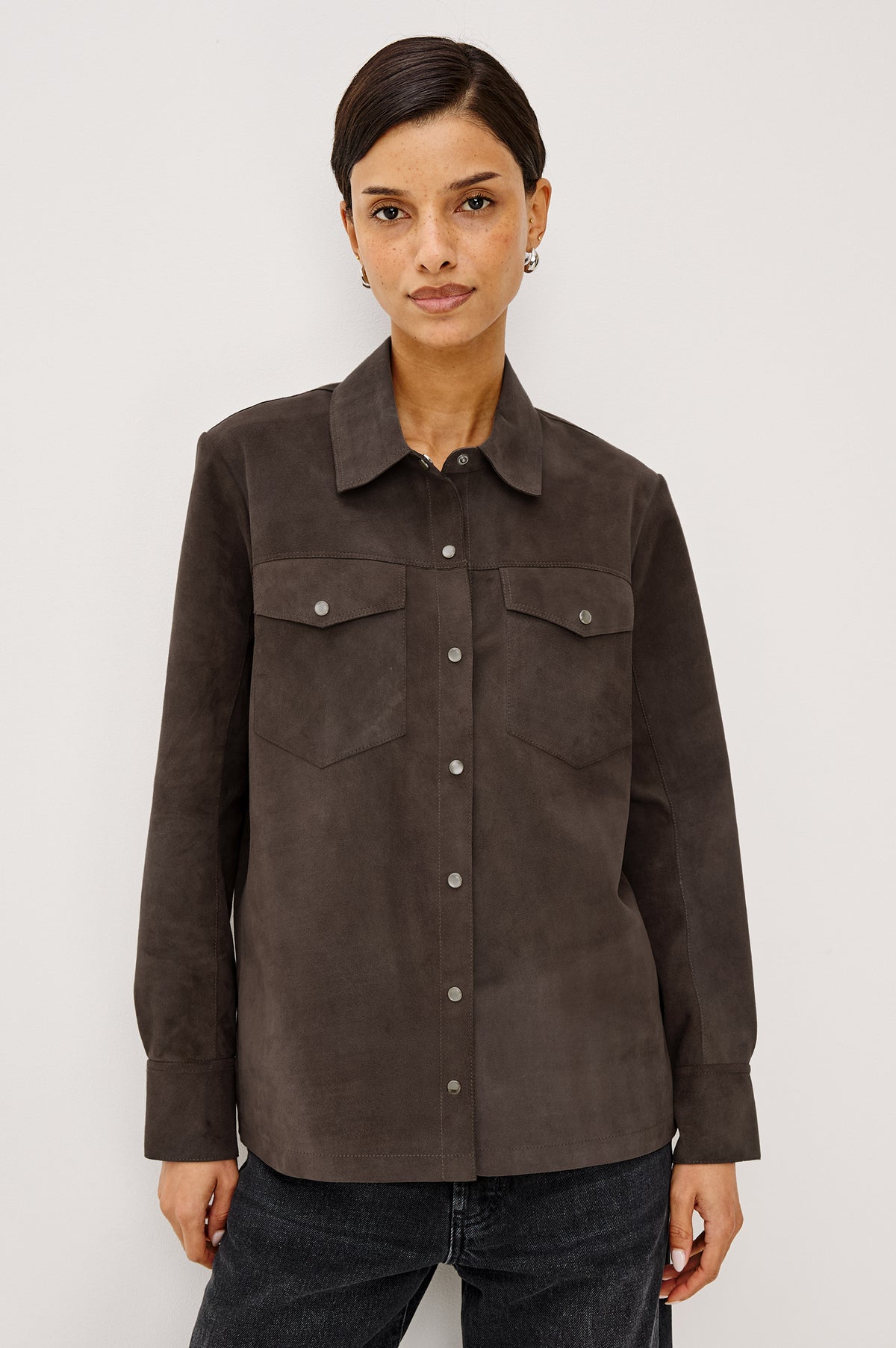 Dean Overshirt in Smooth Suede With Relaxed, Slightly Oversized Fit, Snap-Button Front, Point Collar, Dual Chest Patch Pockets, and Long Sleeves in Espresso Colorway - Upper Body Front View Featured on Model