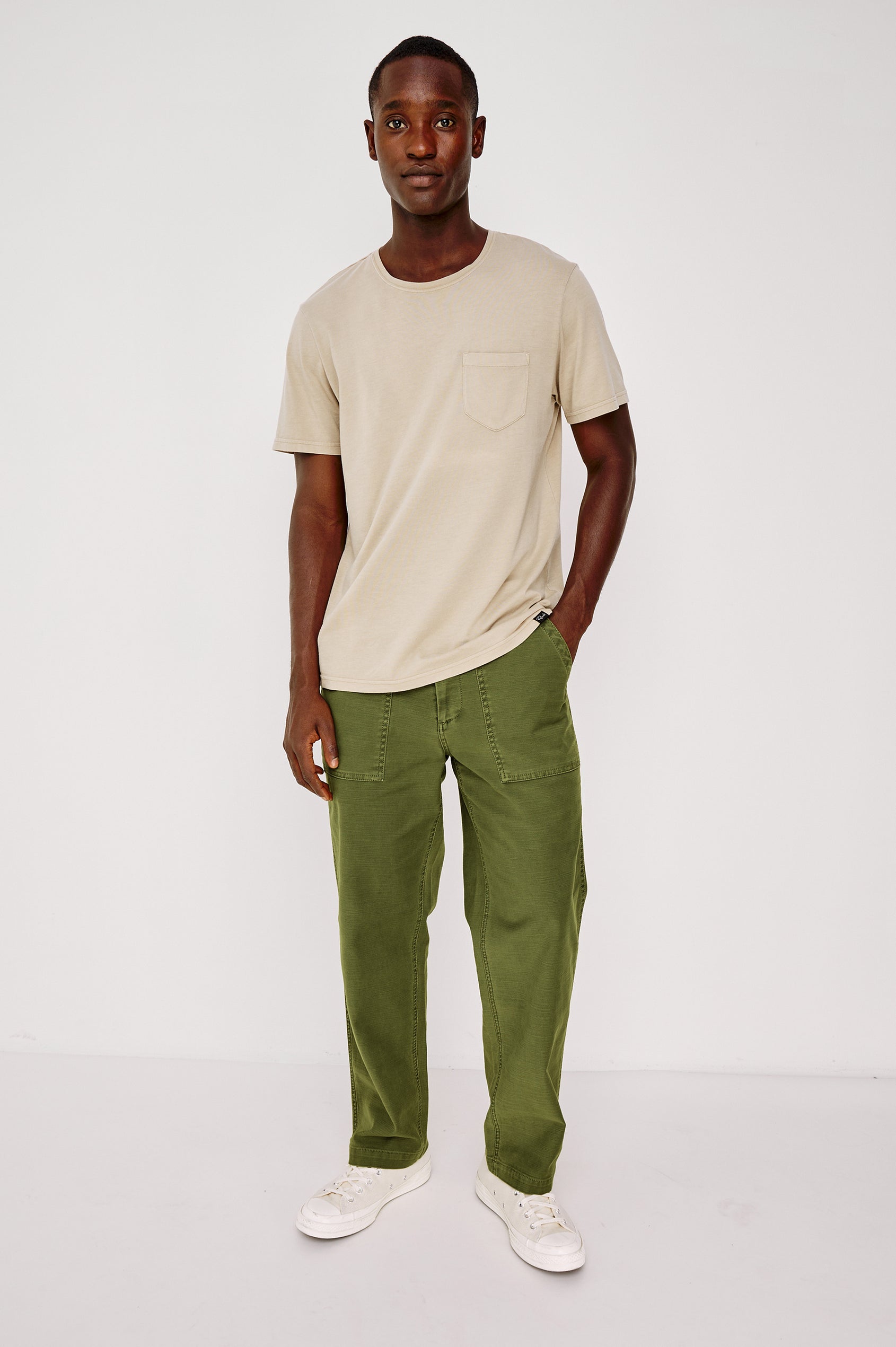 Decker Relaxed Straight Leg Workwear Pant in Stretch Cotton With Lived-In Wash, Zip Fly, and Side and Back Buttoned-Flap Pockets in Olive Colorway - Full Body Front View Featured on Model