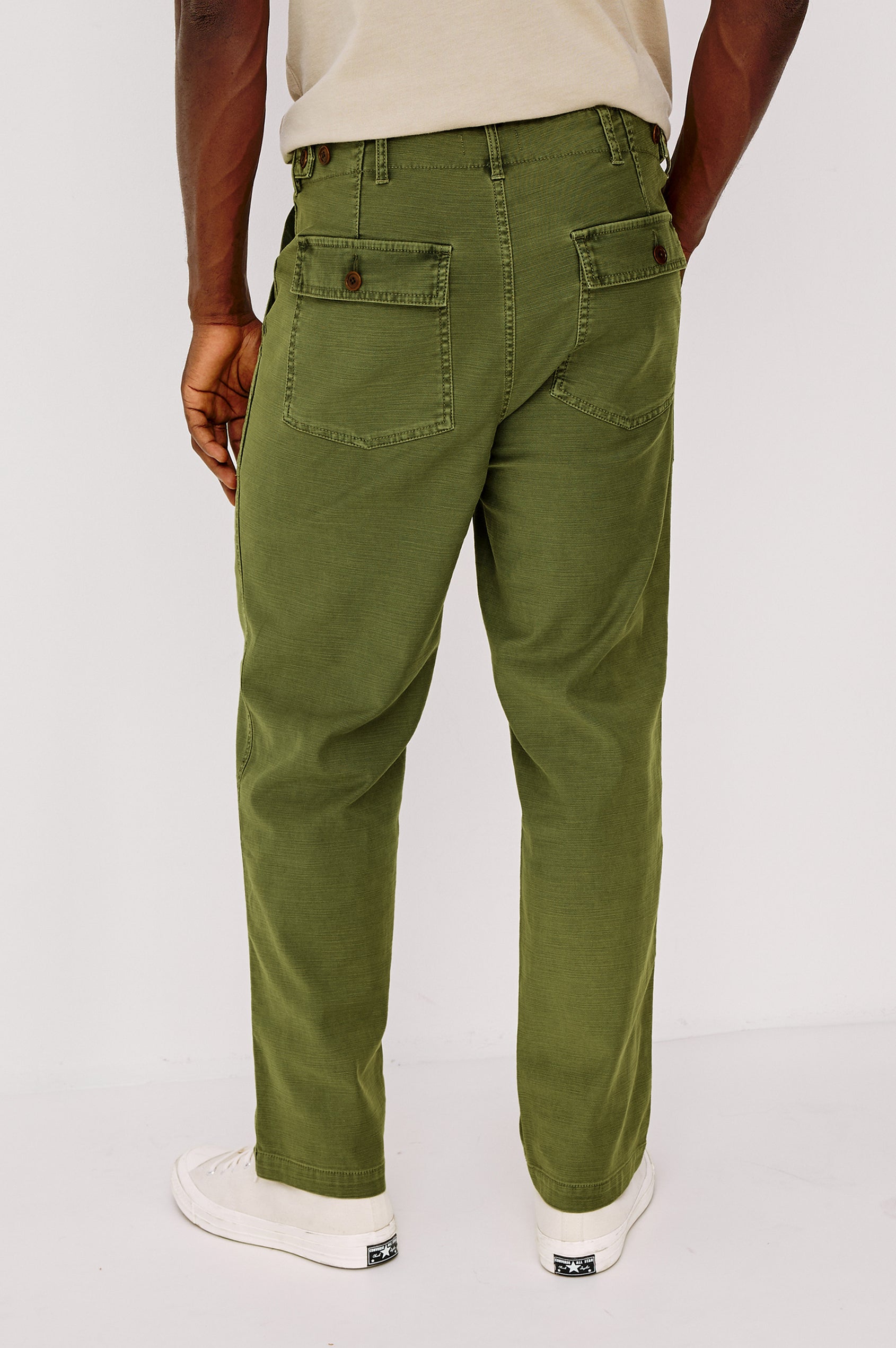Decker Relaxed Straight Leg Workwear Pant in Stretch Cotton With Lived-In Wash, Zip Fly, and Side and Back Buttoned-Flap Pockets in Olive Colorway - Lower Body Back View Featured on Model