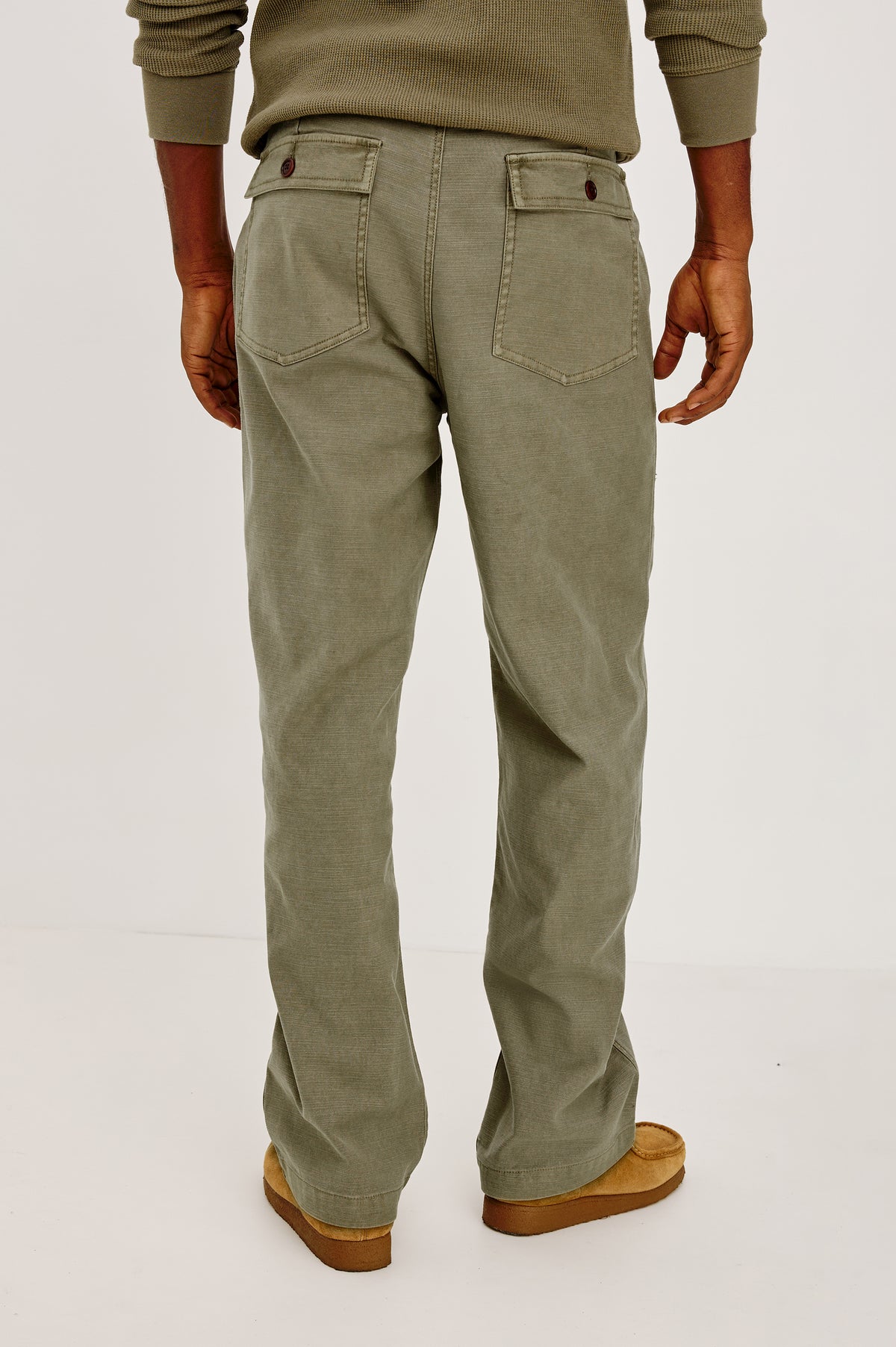 Decker Relaxed Straight Leg Workwear Pant in Stretch Cotton With Lived-In Wash, Zip Fly, and Side and Back Buttoned-Flap Pockets in Terra Colorway - Lower Body Back View Featured on Model