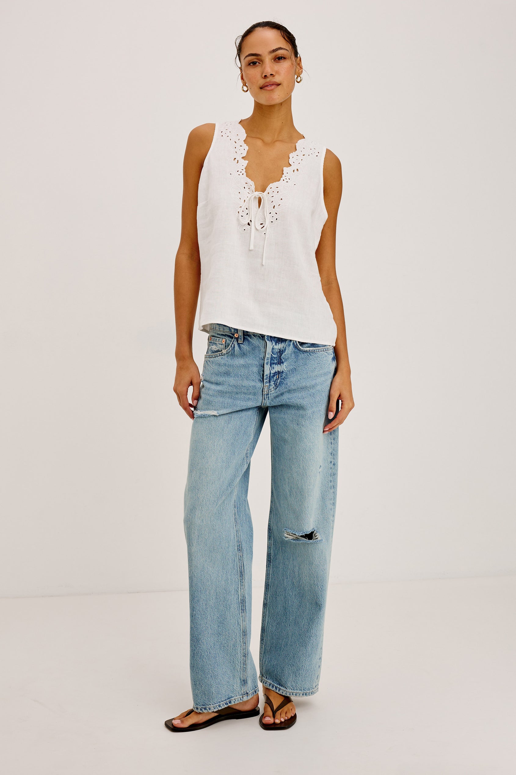 Petite Del Mar Boyfriend Jean With Wide, Relaxed Legs, Distressed Knee and Detailing, and 5-Pocket Vintage-Inspired Design, and Button Fly in Heritage Destructed Colorway - Full Body Front View Featured on Model