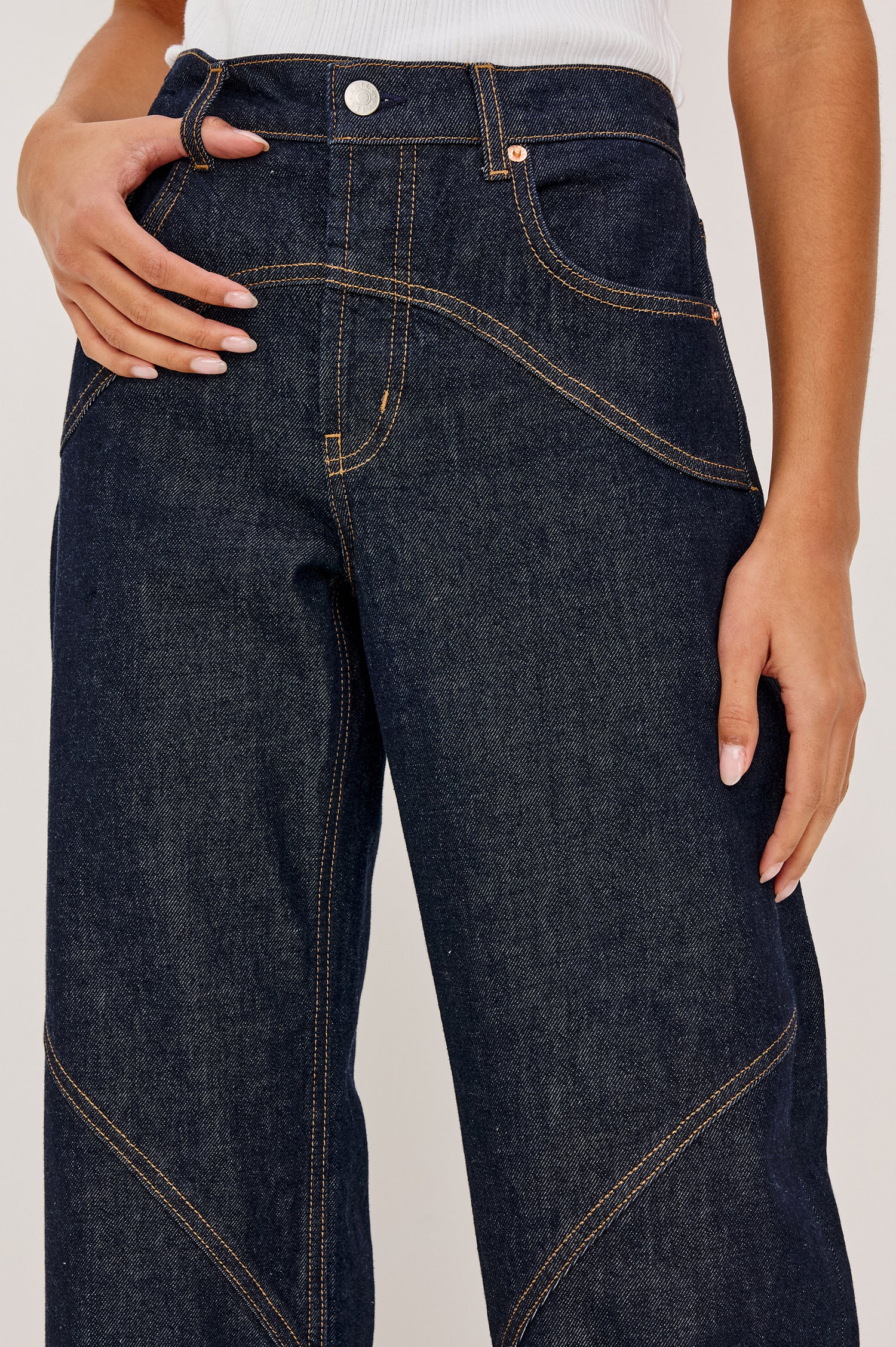 Del Mar Low-Rise Wide Straight Leg Jean in Rigid Dark Wash Denim With Wide Straight Legs, Saddle Seam Detailing, in Onyx Colorway - Lower Body Front Close Up View Featured on Model