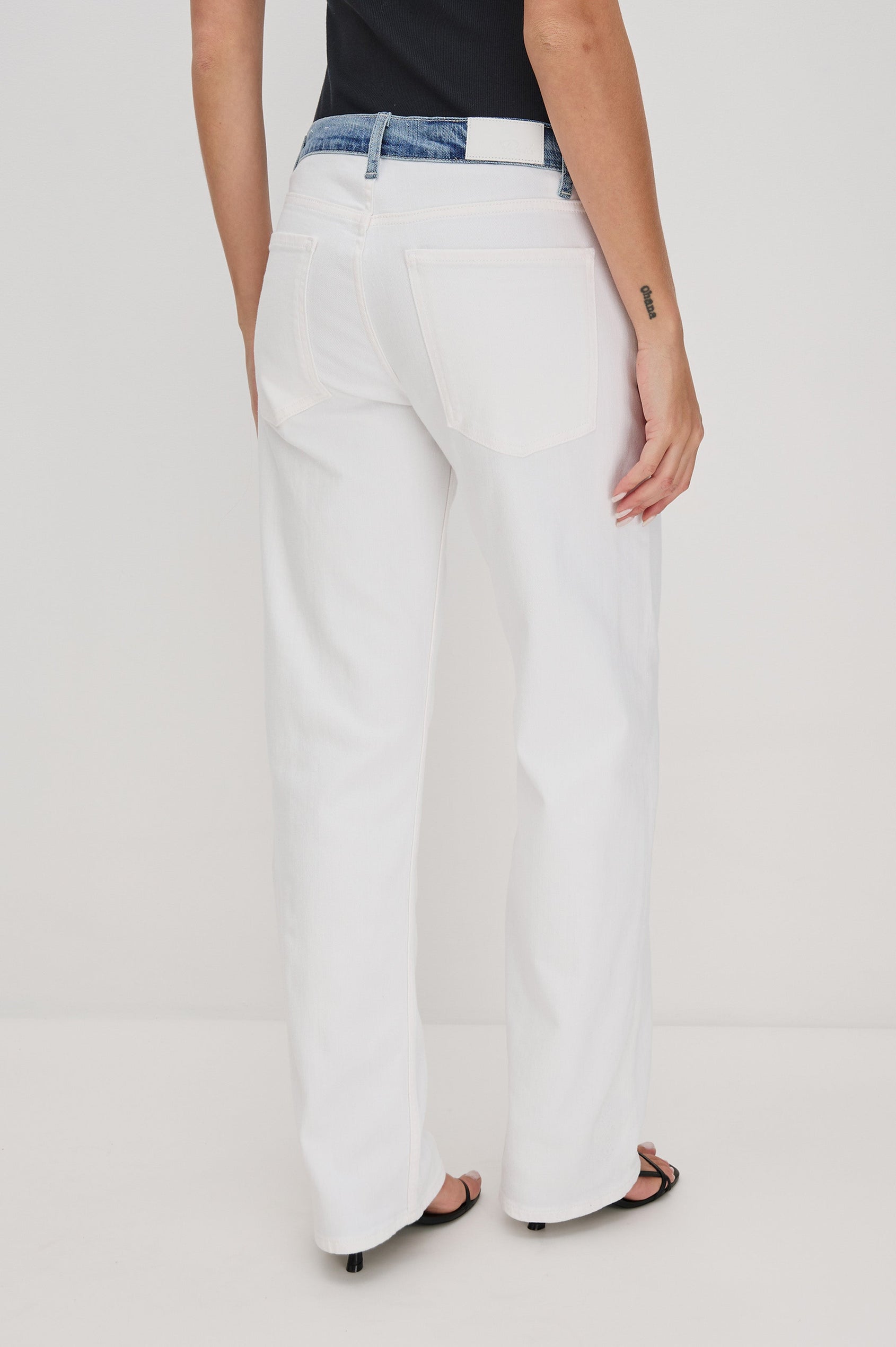 Del Mar low slung baggy boyfriend 5-pocket jean in contrast white and medium wash - Skipper White. Back view on model.