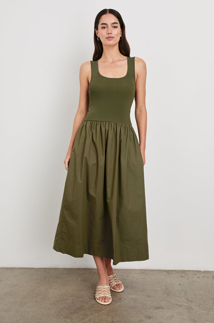 Dia tank midi dress with scoop neck and fitted bodice in Olive colorway - front view on model