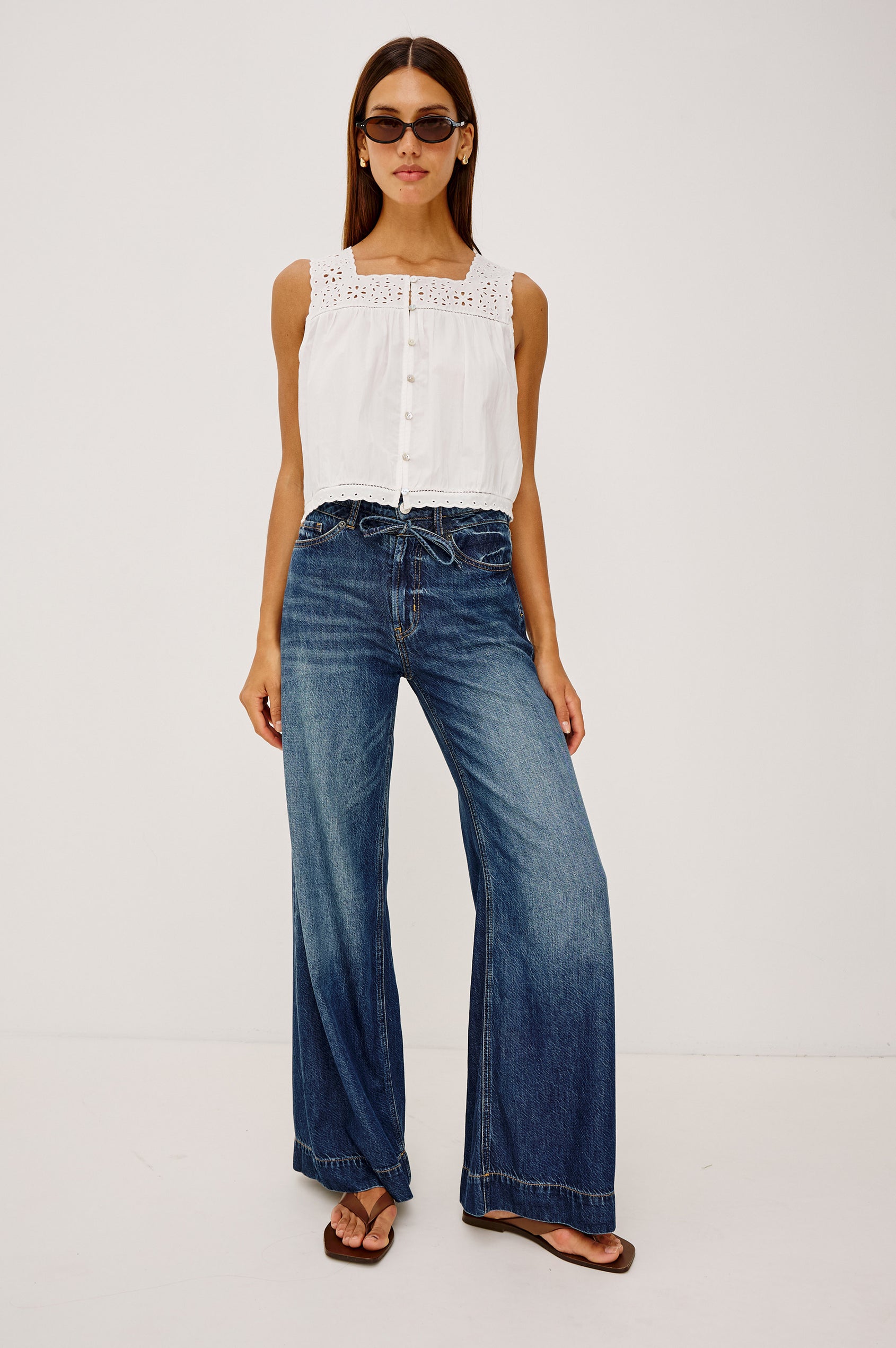 Dover High-Rise Palazzo Jean in Rigid Denim With Relaxed Fit, Zip Fly, Adjustable Waist Ties, and Wide, Drapey Legs in Boondocks Colorway - Full Body Front View Featured on Model