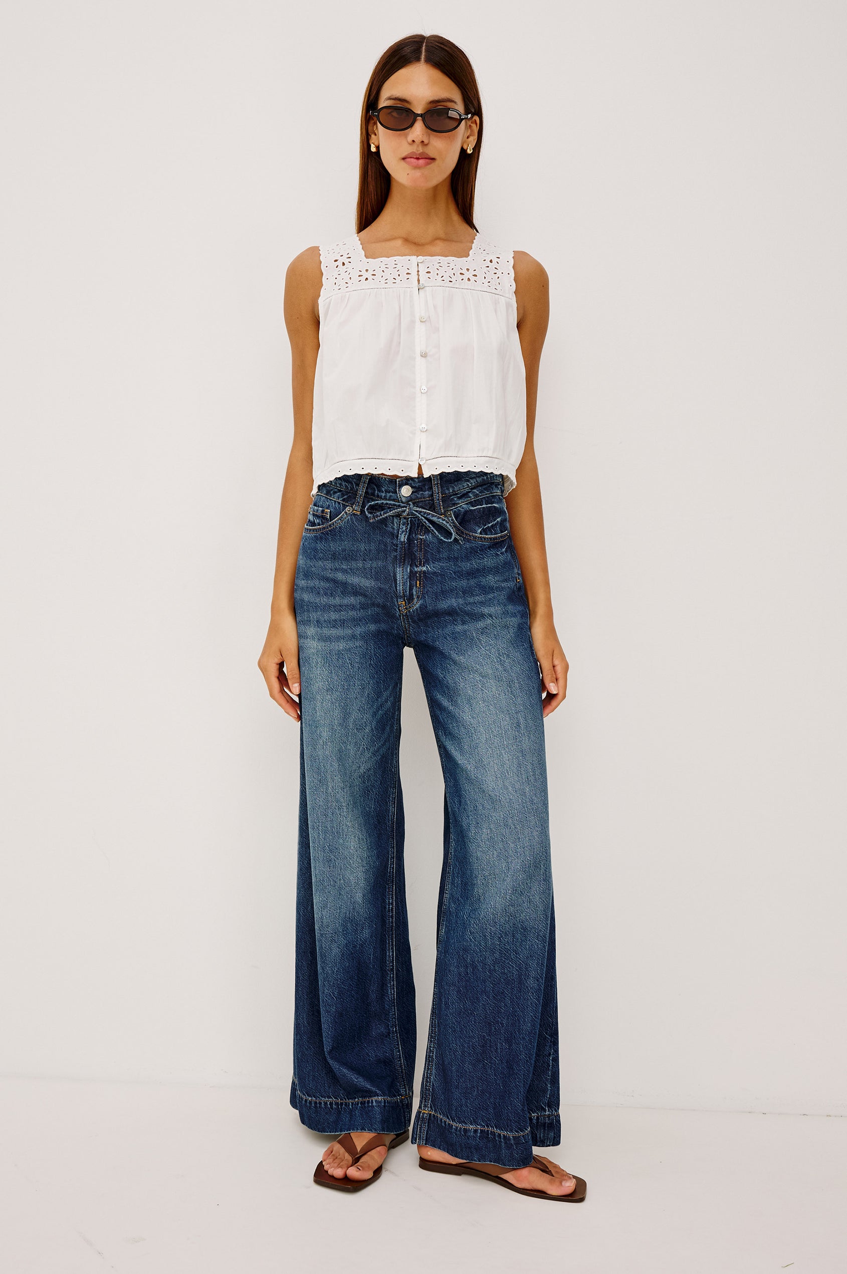 Dover High-Rise Palazzo Jean in Rigid Denim With Relaxed Fit, Zip Fly, Adjustable Waist Ties, and Wide, Drapey Legs in Boondocks Colorway - Full Body Front View Featured on Model