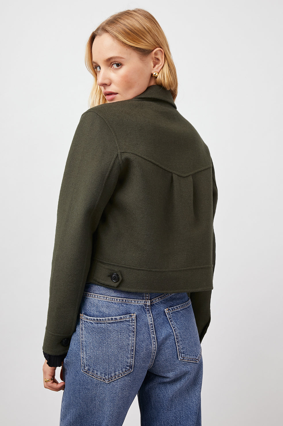 Easton Slightly Cropped Jacket with Button Closure, Two Chest Button Flap Pockets and Western Yokes in Olive Colorway - Back View Featured on Model