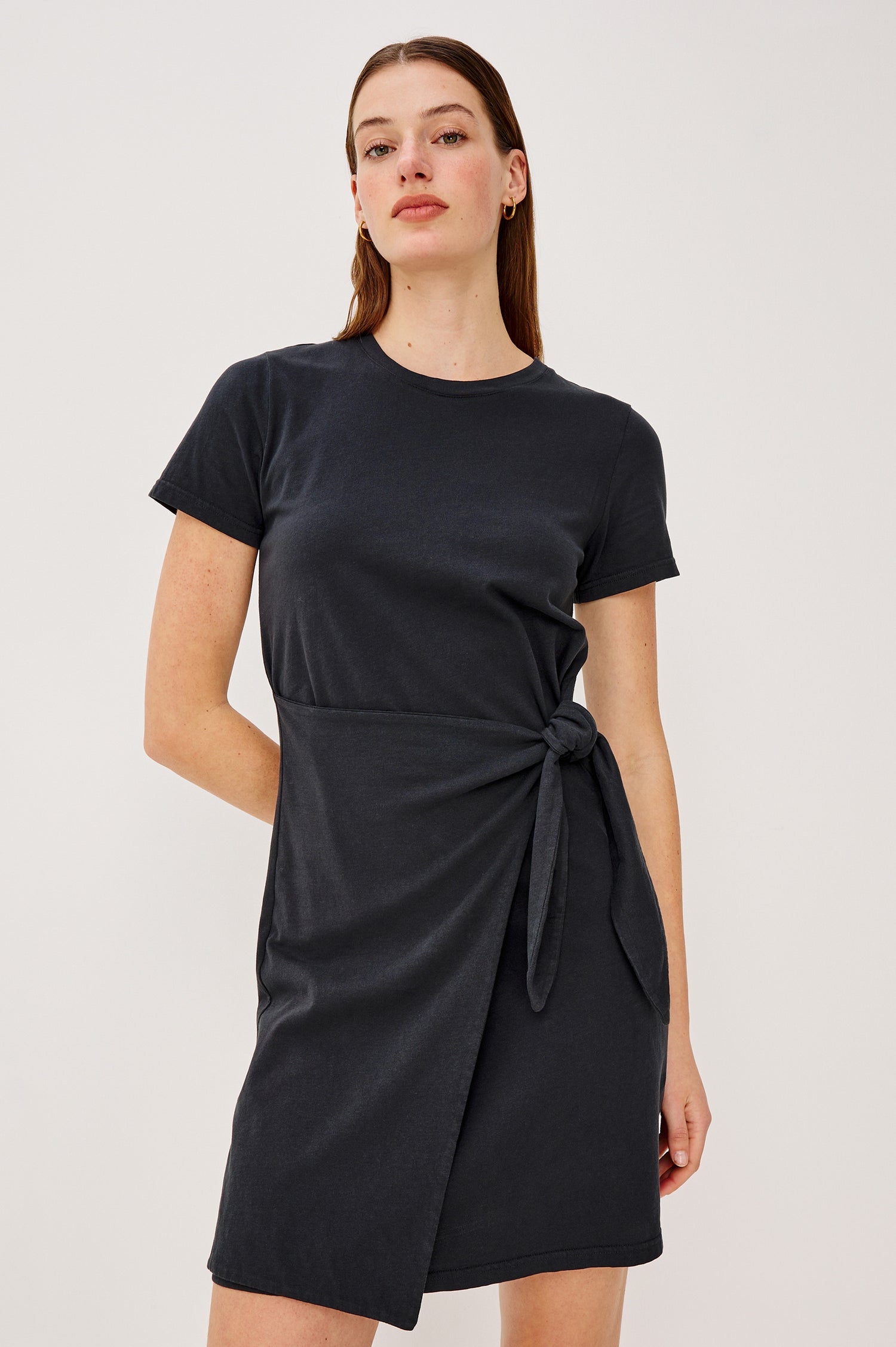 Edie Mini Dress in Sueded Cotton Jersey With Short Sleeves, Crew Neckline, and Adjustable Wrap Waist Ties in Black - Upper Body Front View Featured on Model