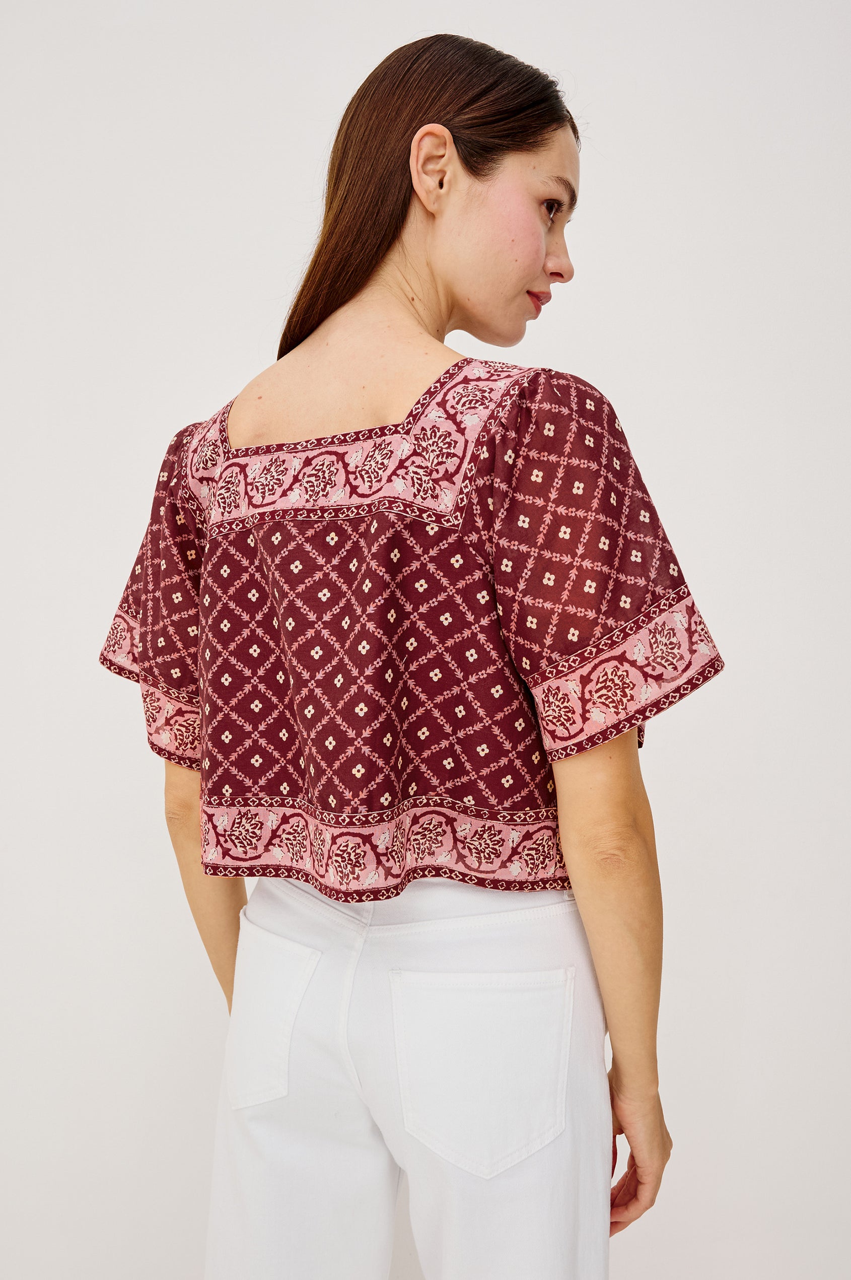 Ellen Cropped Cotton Shirt With Square Neckline Cropped Boxy Silhouette Front Buttons and Flared Short Sleeves in Flower Chain Colorway - Upper Body Back View Featured on Model