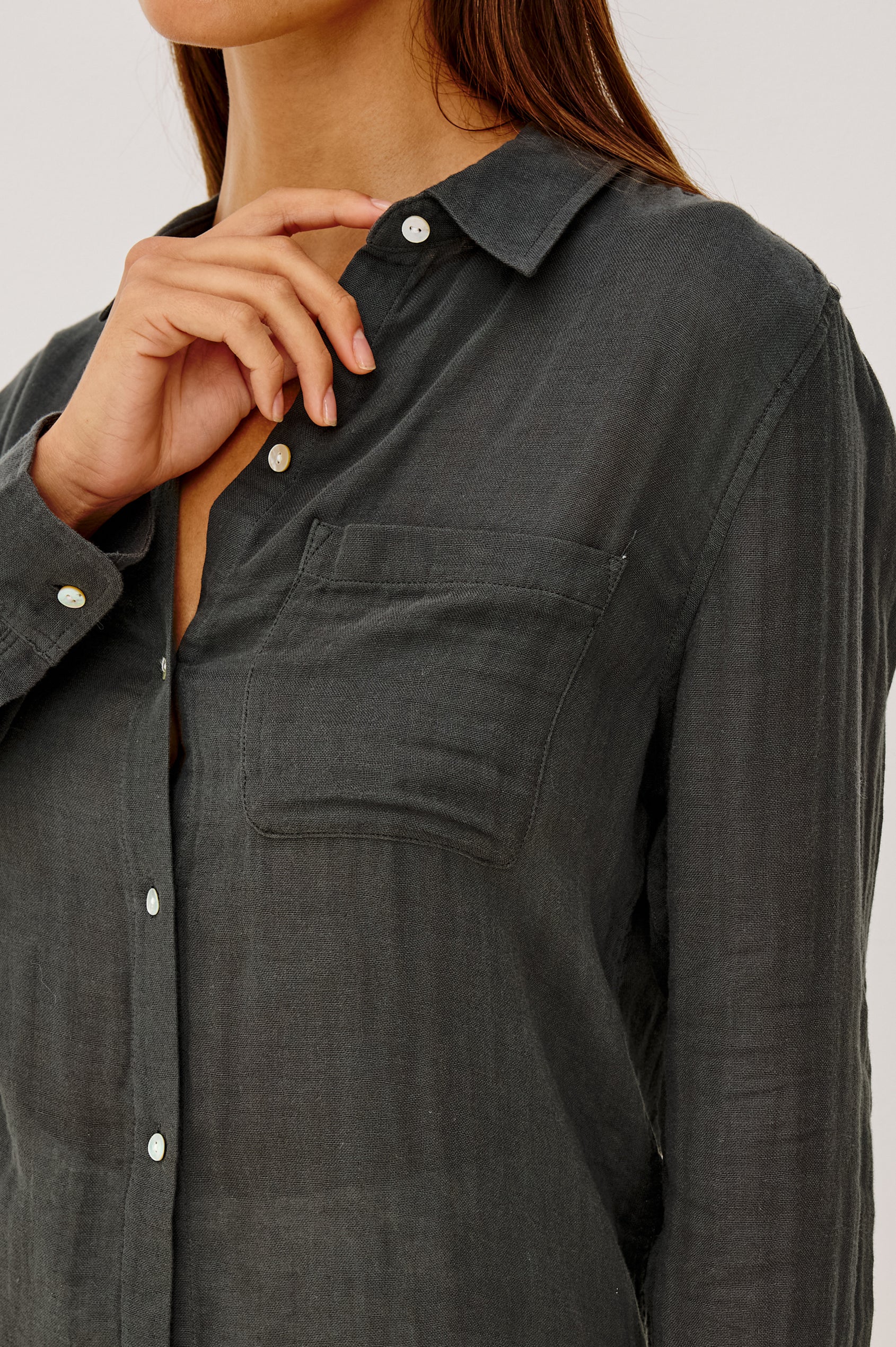 Ellis Button-Up Shirt in Cotton Gauze With Relaxed Fit, Chest Patch Pocket, and Long Sleeves in Washed Black Colorway - Upper Body Front View Featured on Model