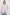 Elsa Long-Sleeve Button Down Shirt with Chest Patch Pocket in Cherry Blossom Stripe Colorway, Thin Black and White Vertical Stripes on Pink - Front Untucked View Featured on Model