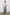 Elsa Long-Sleeve Button Down Shirt with Chest Patch Pocket in Cherry Blossom Stripe Colorway, Thin Black and White Vertical Stripes on Pink - Front Untucked Full Body View Featured on Model
