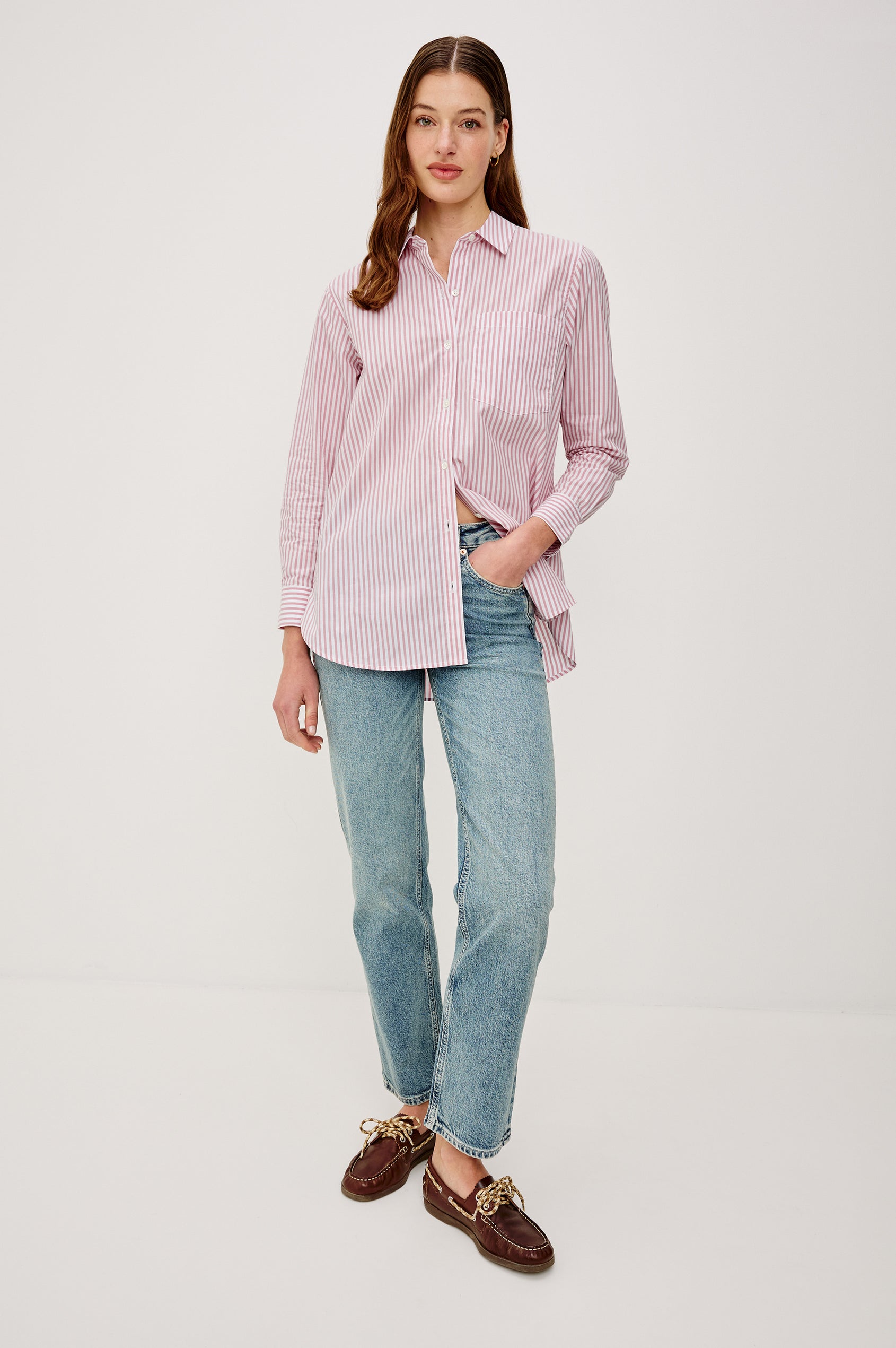 Elsa Button-Up Shirt in Cotton Poplin With Relaxed Oversized Fit Classic Chest Pocket Long Sleeves and Curved Hem in Rose Stripe Colorway - Full Body Front View Featured on Model