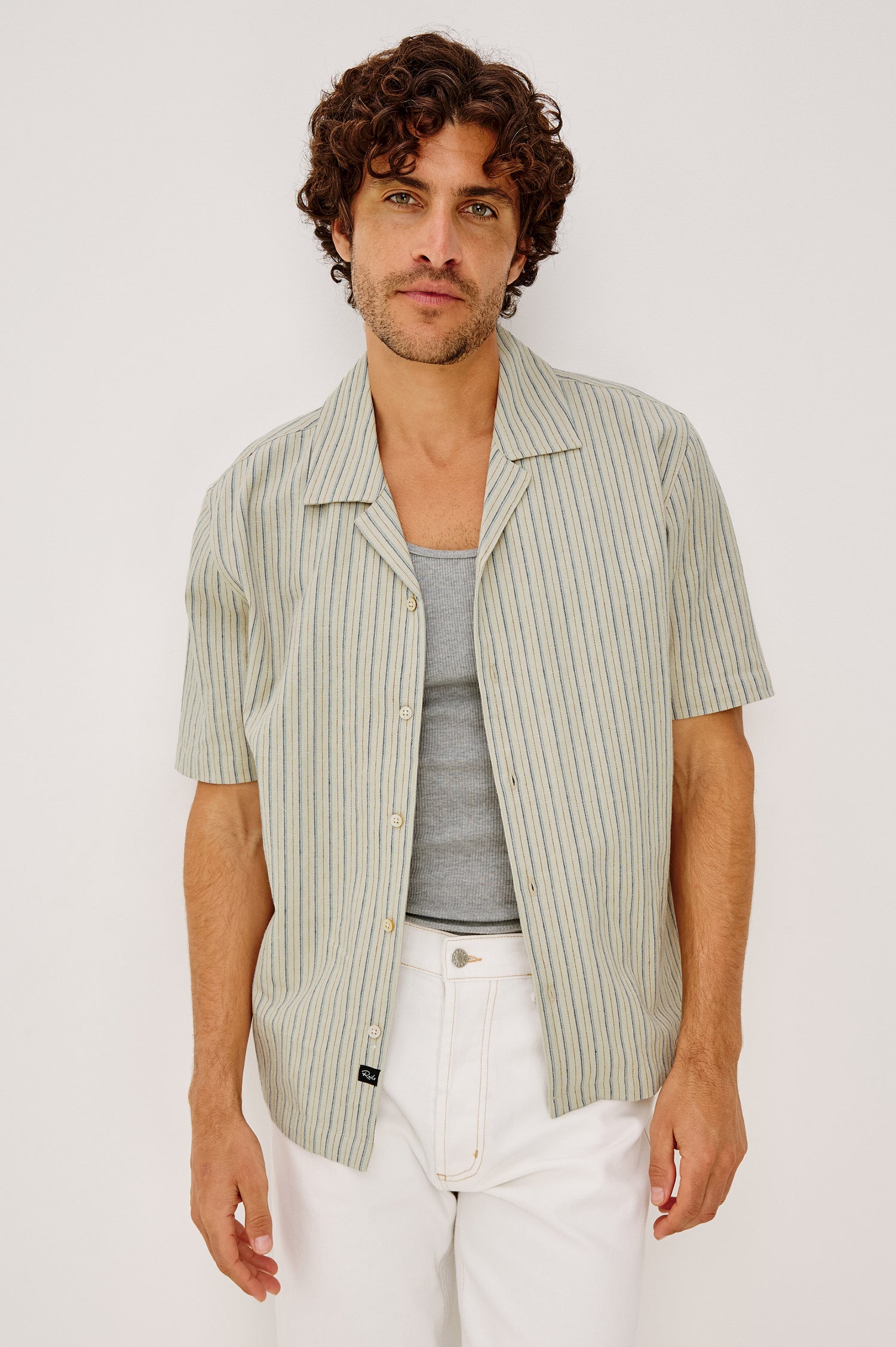 Ely Camp Shirt in Homespun Weave With Collar, Short Sleeves, Front Buttons, and Slightly-Boxy Fit in Multi Stripe Colorway - Upper Body Front View Featured on Model