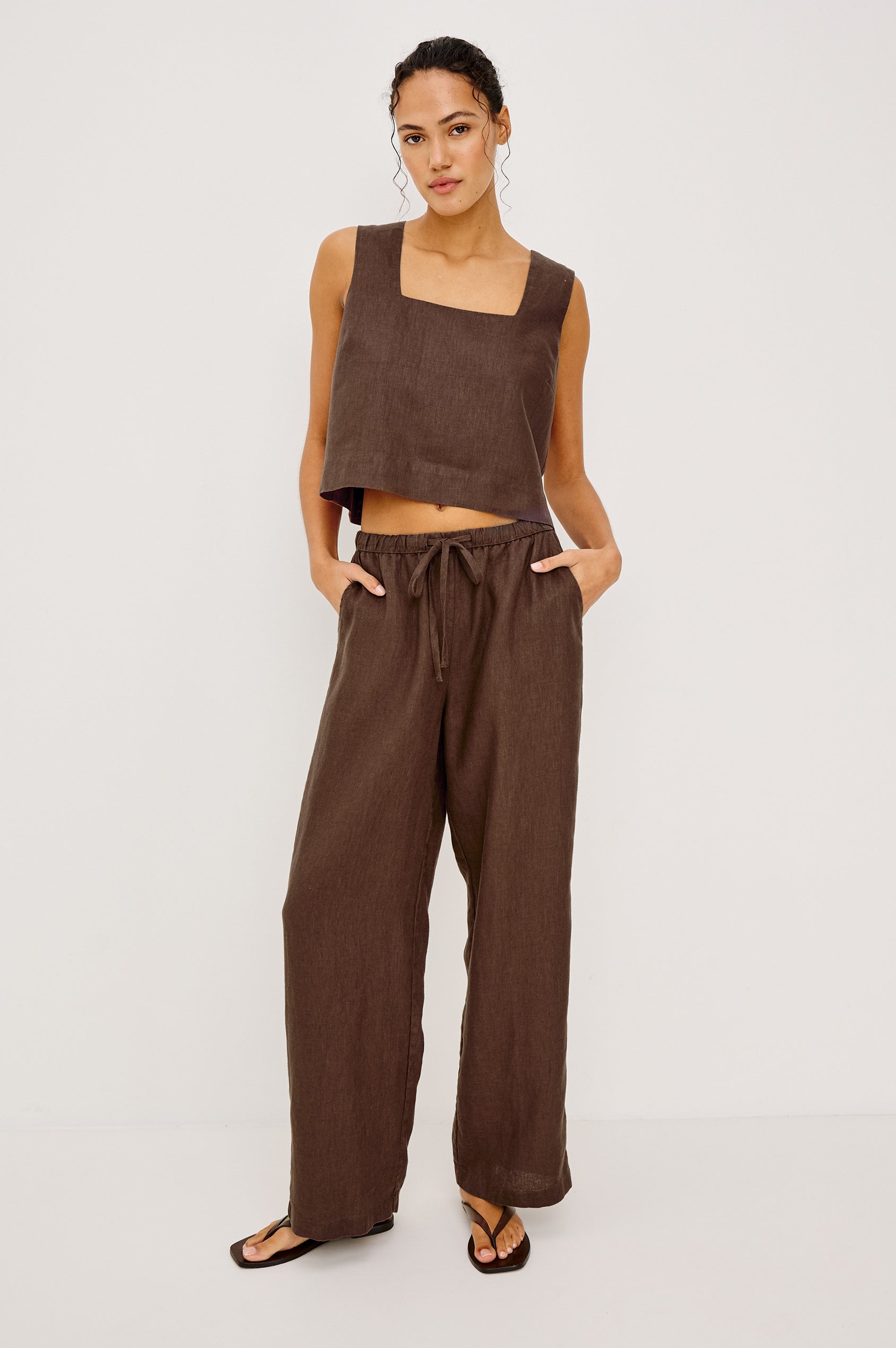 Emmie Straight Leg Pant in Linen With Adjustable Drawstring Waist Ties â€” Lower Body Front View Featured on Model