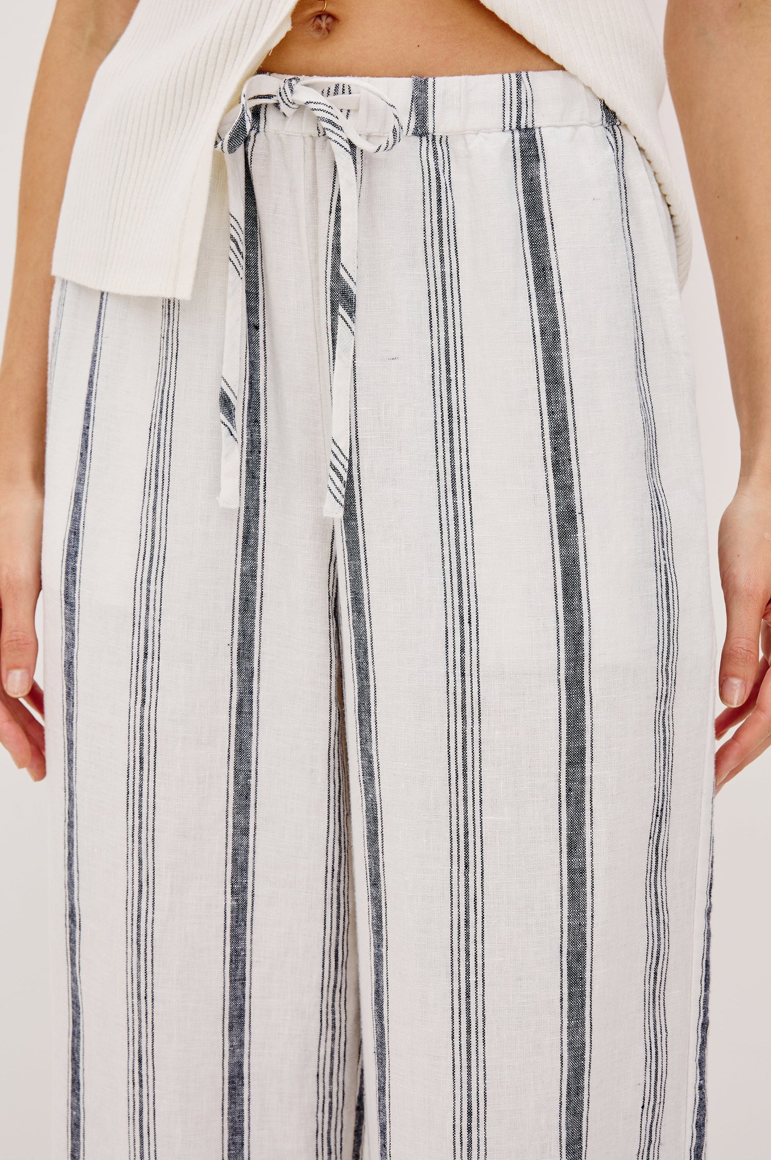 Emmie high rise linen wide leg pant with drawstring in Taverna Stripe colorway- front detail view on model.