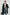 Everest Mid-Thigh Length Coat with Single Button Closure, Notched Lapels and Front Patch Pockets in Black Colorway - Front Full Body View Featured on Model