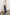 Everest Mid-Thigh Length Coat with Single Button Closure, Notched Lapels and Front Patch Pockets in Oatmeal Colorway - Front Full Body View Featured on Model