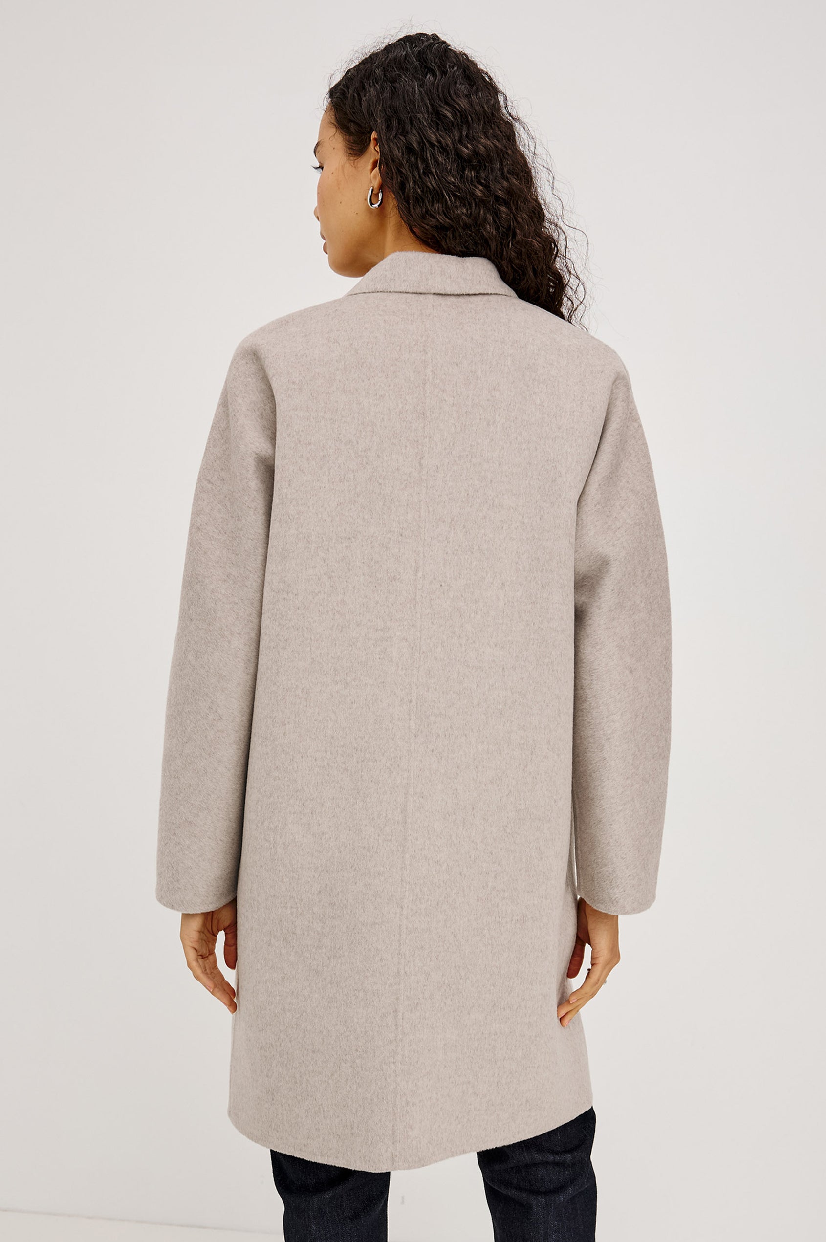 Everest Coat in Heavy Wool Blend With Longline Cut, Slightly Oversized Relaxed Fit, Lapel Collar, Single-Button Front, and Front Patch Pockets in Oatmeal Colorway - Upper Body Back View Featured on Model