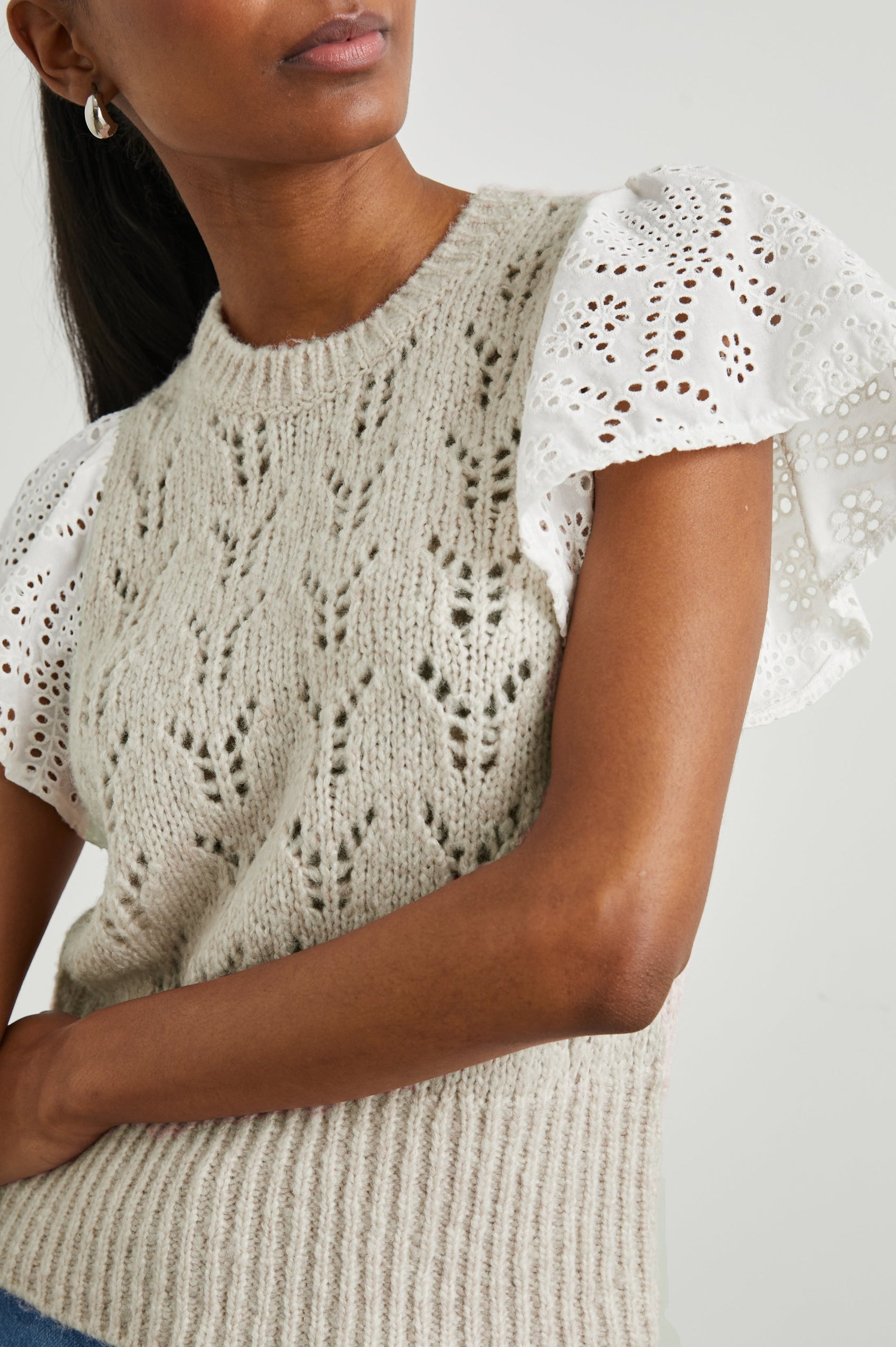 Everly Top with a Knit Bodice with Ribbed Trim and a Crew Neck and White Cotton Short Sleeves with Eyelets In Oat Colorway - Front View Featured on Model
