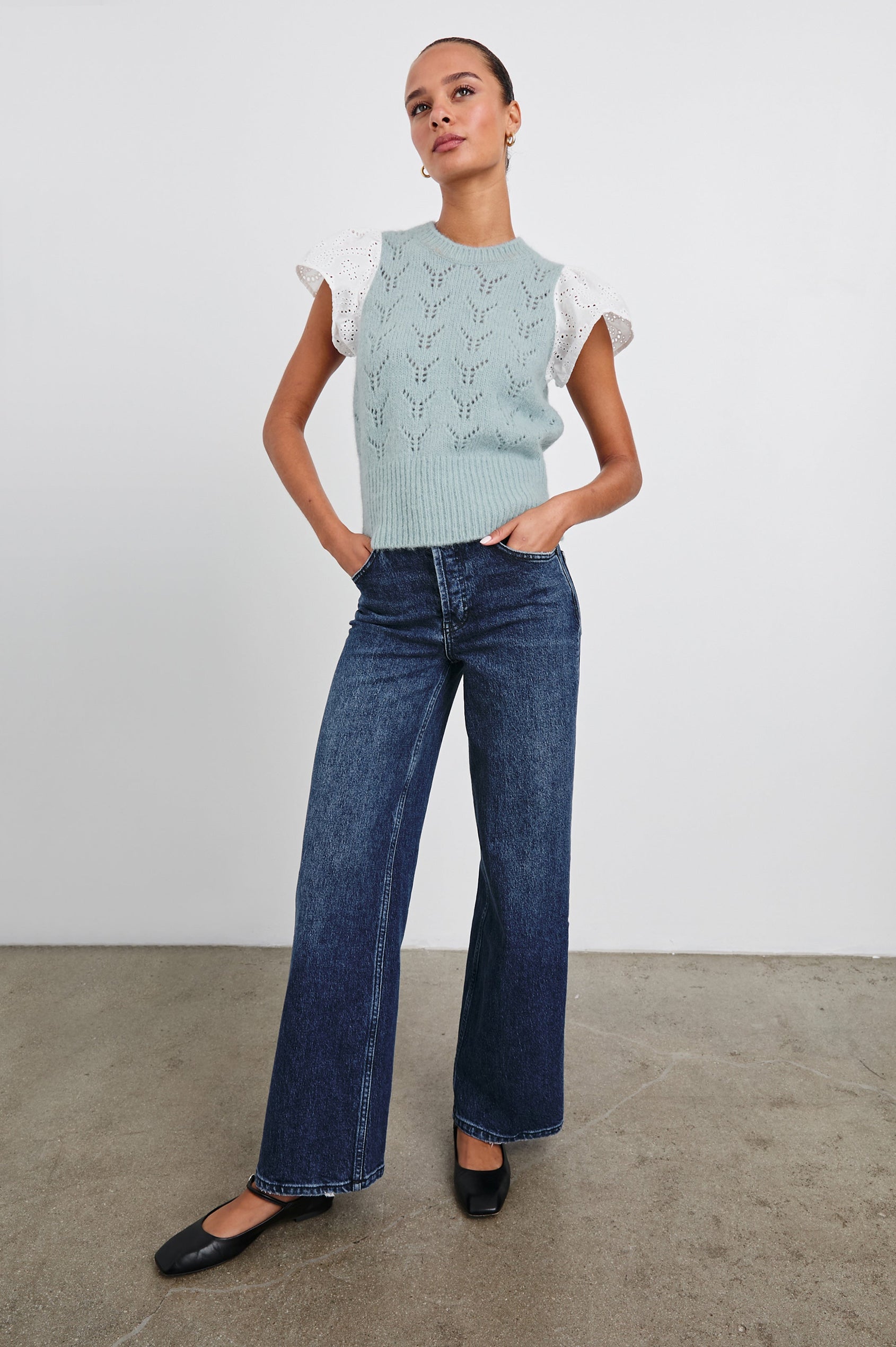 Everly Top with a Knit Bodice with Ribbed Trim and a Crew Neck and White Cotton Short Sleeves with Eyelets In Sky Colorway - Front Full Body View Featured on Model