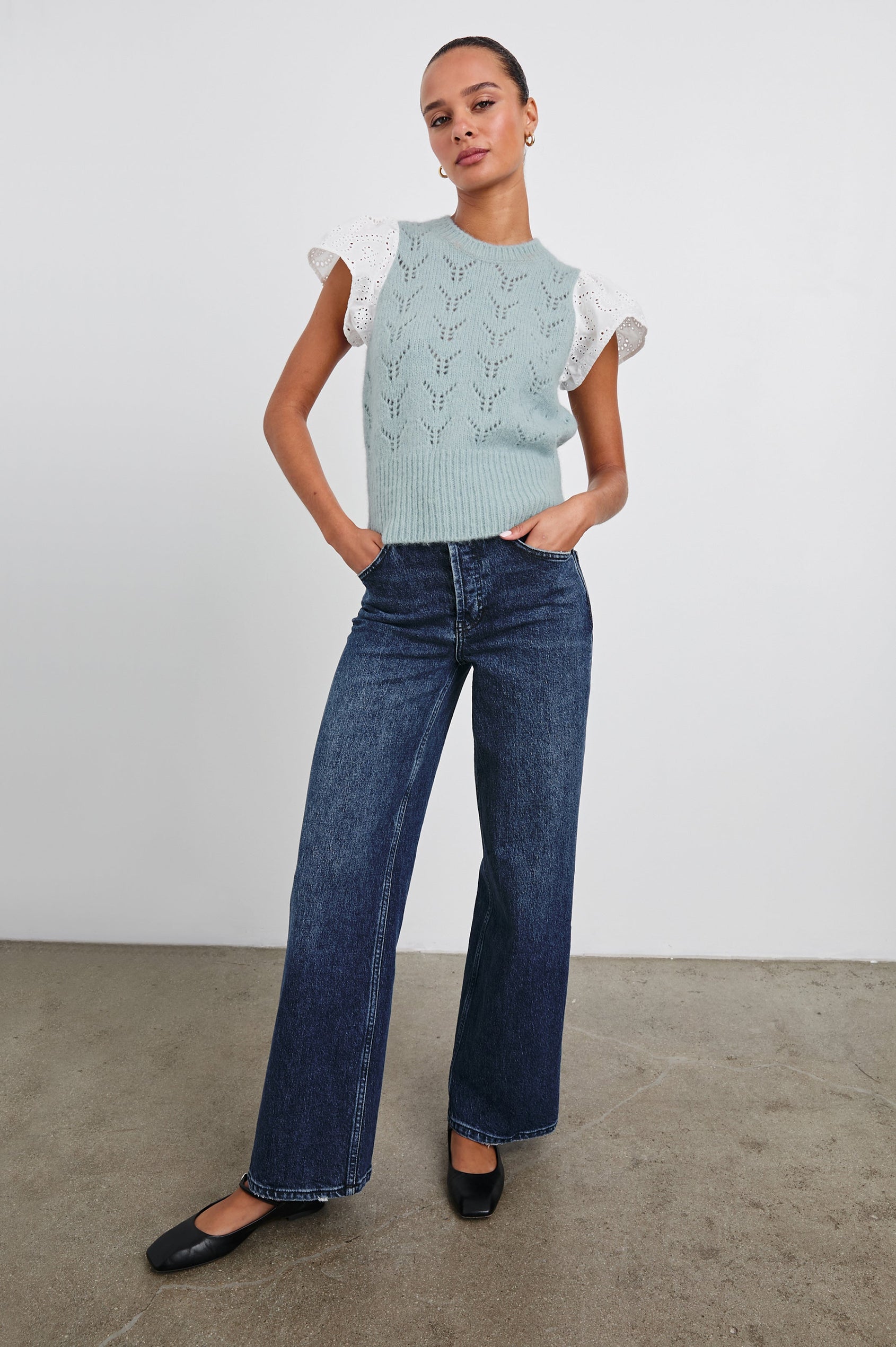 Everly Top with a Knit Bodice with Ribbed Trim and a Crew Neck and White Cotton Short Sleeves with Eyelets In Sky Colorway - Front Full Body View Featured on Model