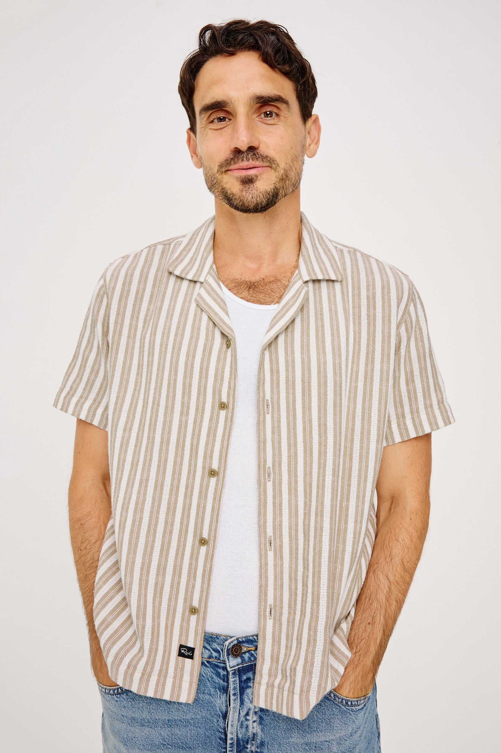 Fielder Camp Shirt With Front Buttons, Short Sleeves, and Relaxed, Boxy Fit in Blue Jay Stripe Colorway - Upper Body Front View Featured on Model
