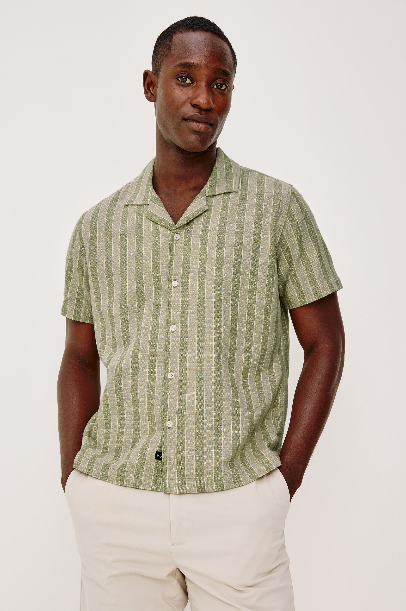 Fielder Button Front Shirt With Short Sleeves and Relaxed Boxy Fit in Sage Brush Stripe Colorway - Upper Body Front View Featured on Model
