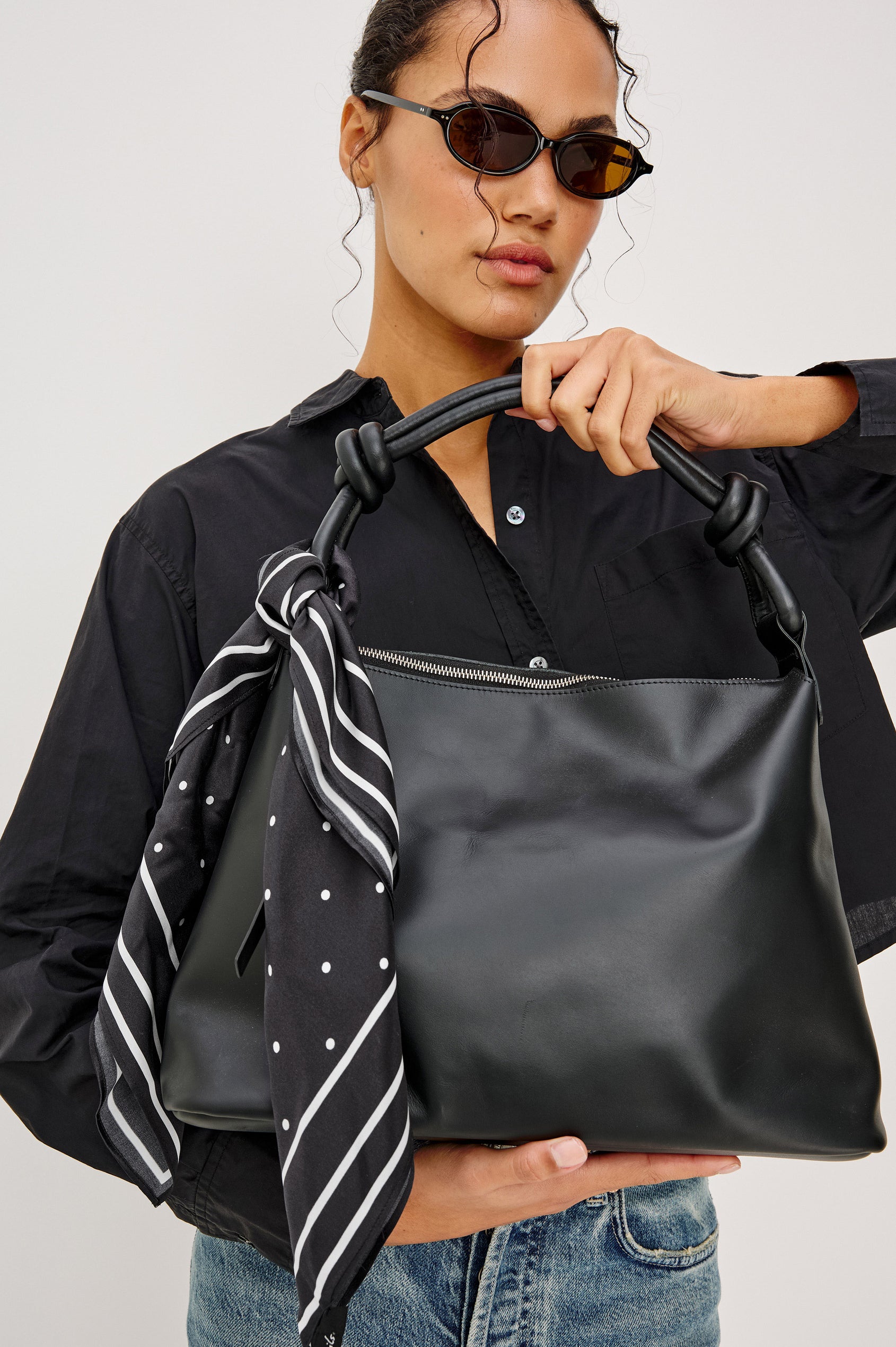 Finna Square Scarf in 100% Silk With Contrast Polka Dots and Striped Outline in Black Colorway - Stylized View Featured on Model