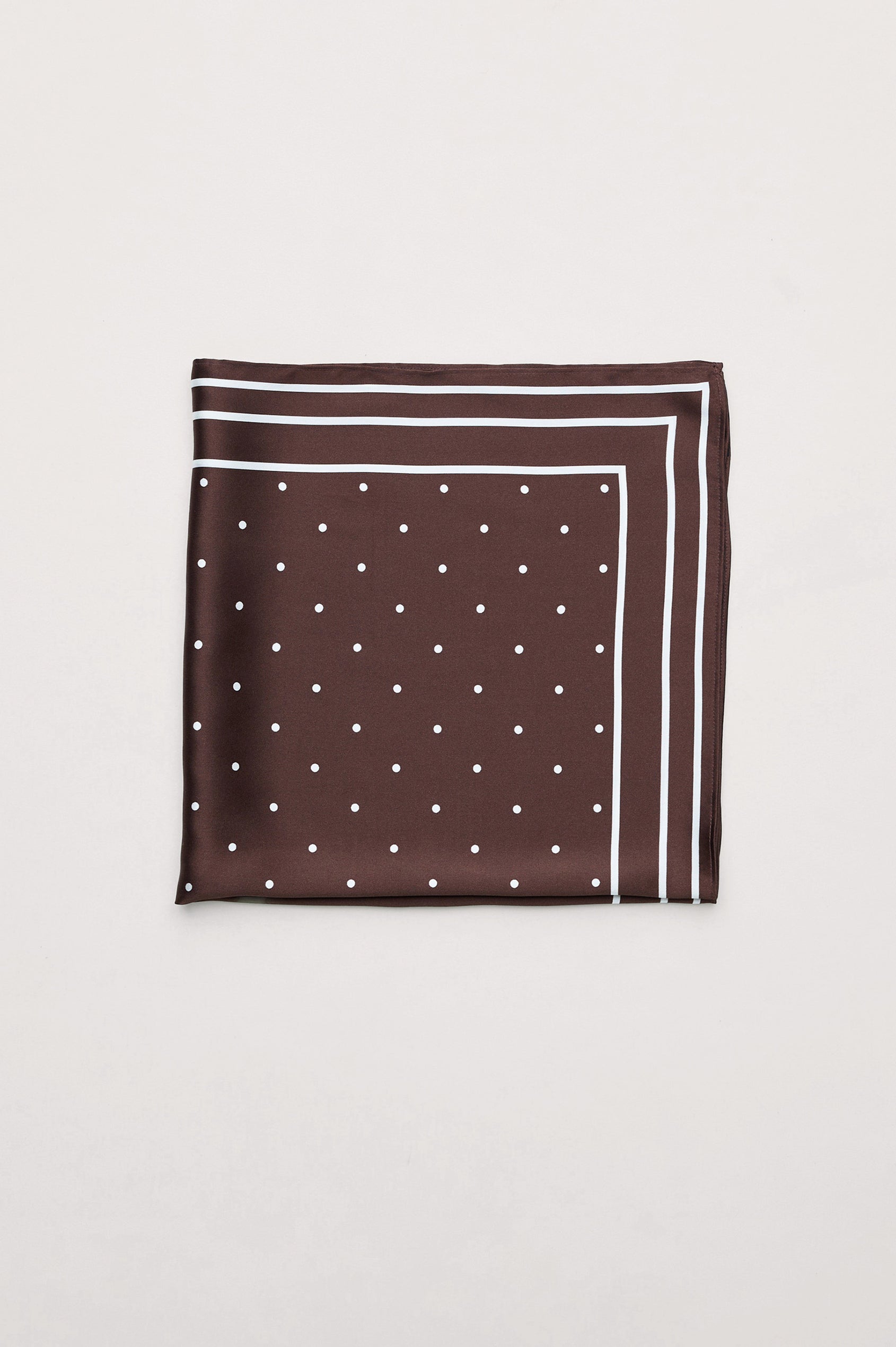Finna Square Scarf in 100% Silk With Contrast Polka Dots and Striped Outline in Brown Colorway - Folded Flat Lay View Featured