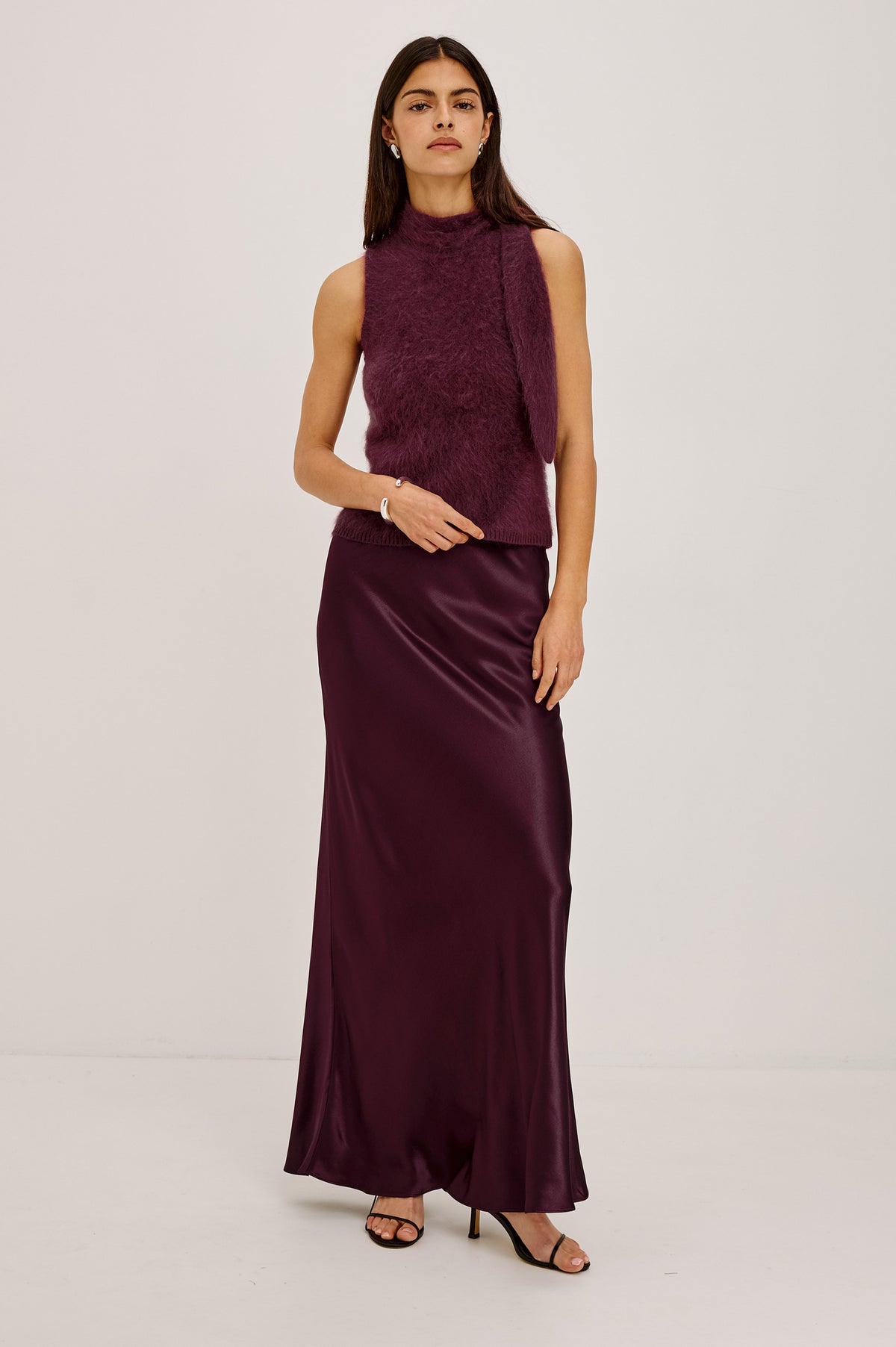 Flora Top in Brushed Knit With Mock Neck, Tie Detail, and Sleeveless Silhouette in Wine Colorway - Full Body Front View Featured on Model.