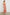 Florian Midi Dress with a V-Neckline, Spaghetti Straps, and Buttons down the front in Red Posy Colorway, Red, Blue and Orange on Tan - Back Full Body View Featured on model