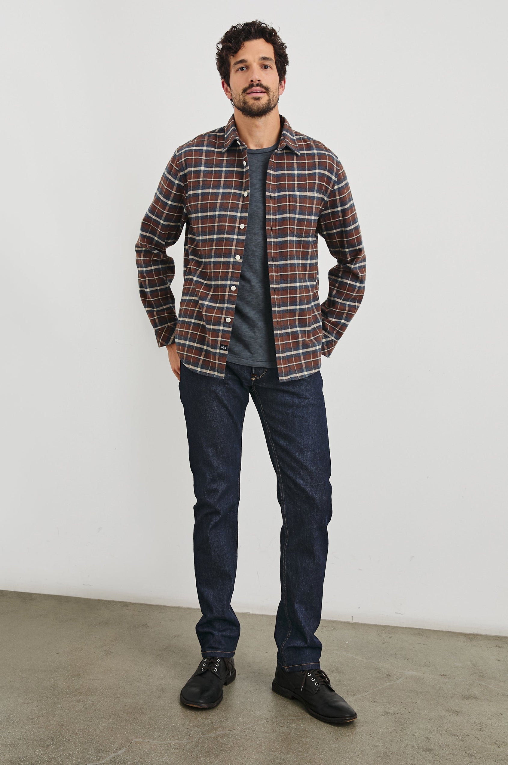 Forrest Long-Sleeve Button Up with a Chest Patch Pocket in Hickory Blue Melange Colorway, a Brown, Blue and White plaid - Front View Full Body Featured on Model