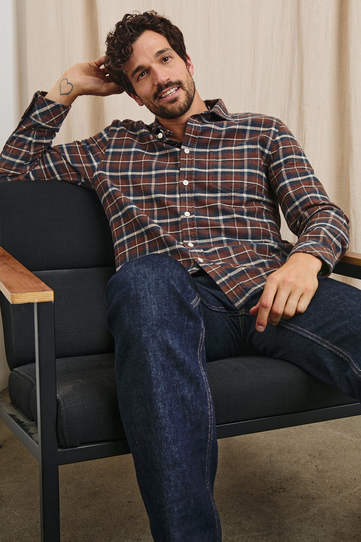 Forrest Long-Sleeve Button Up with a Chest Patch Pocket in Hickory Blue Melange Colorway, a Brown, Blue and White plaid - Front Full Body View Featured on Seated Model