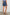 Foster Shorts with Paperbag Drawstring Waist, Large Front Pockets and Decorative Back Pockets in Classic Blue Colorway - Back View Featured on Model