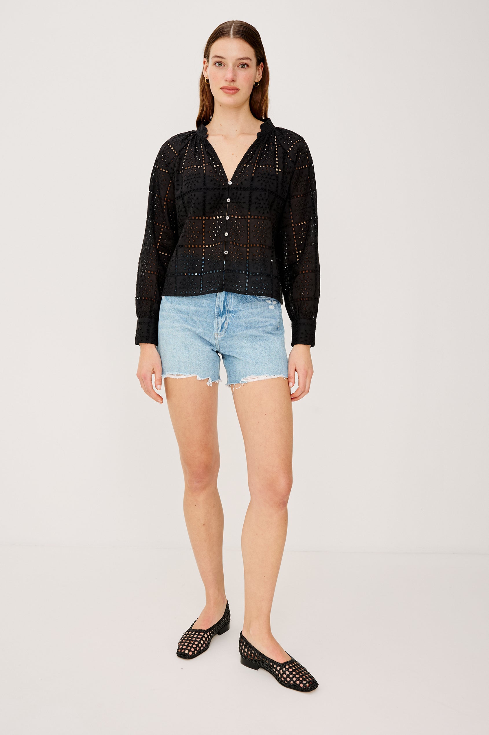 Francine Top in Cotton With Boxy FIt Front Buttons Split V-Neck Band Collar Semi-Sheer Embroidered Grid Floral Cutwork and Long Puff Sleeves With Fitted Cuffs - Full Body Front View Featured on Model