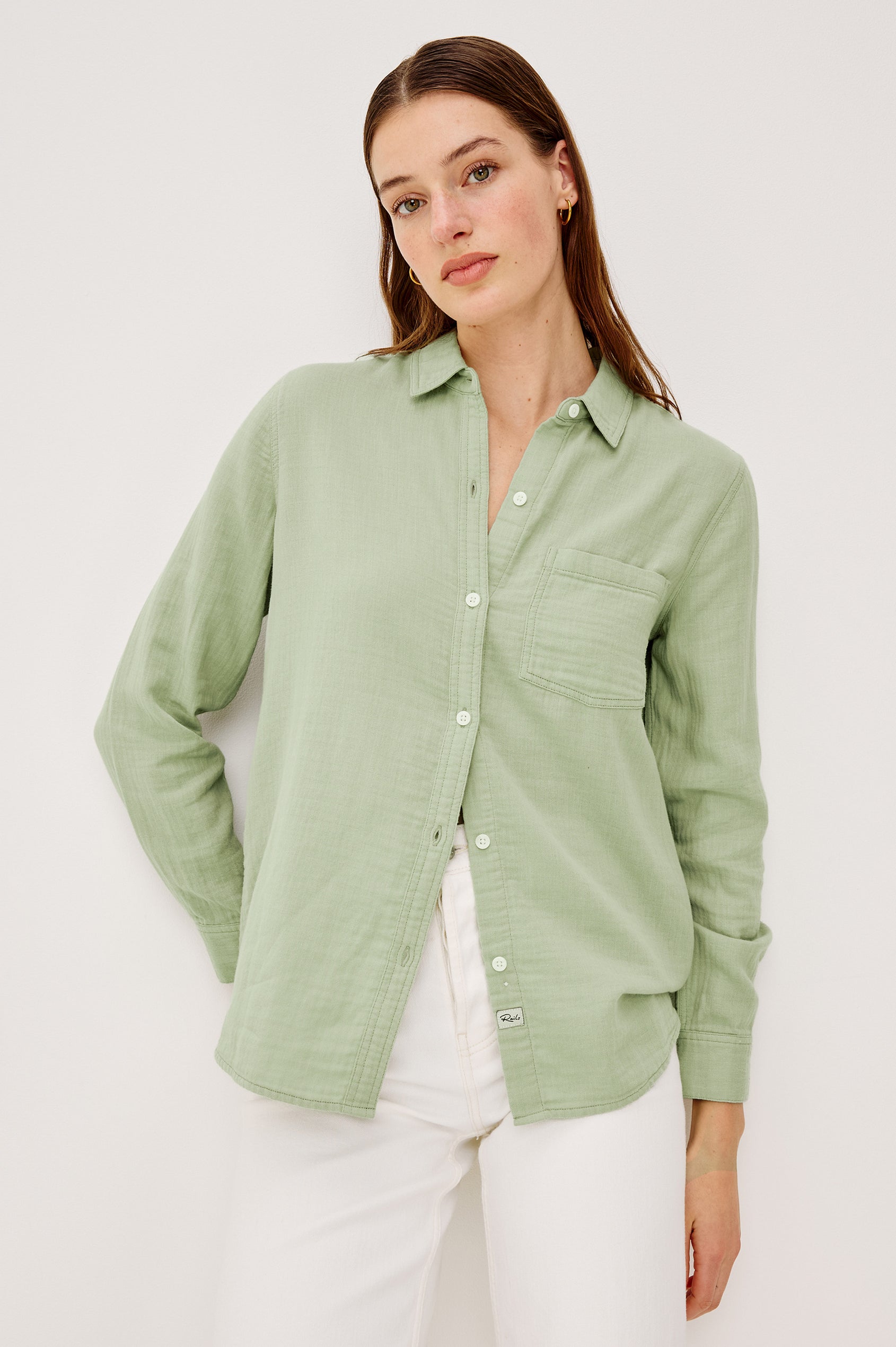 Freeman Button-Up Collared Shirt With Subtle Herringbone Texture Relaxed FIt Chest Patch Pockets and Long Sleeves in Vintage Sage Colorway - Upper Body Front View Featured on Model